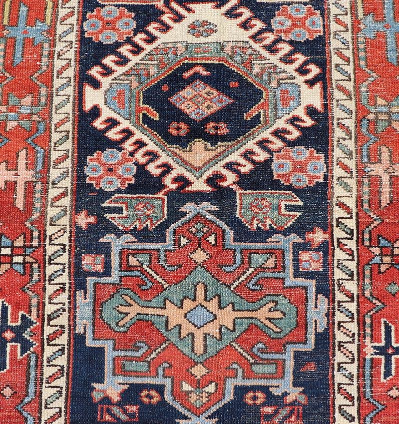 Hand-Knotted Antique Heriz Serapi Runner with Colorful Highly Stylized Medallion Design For Sale