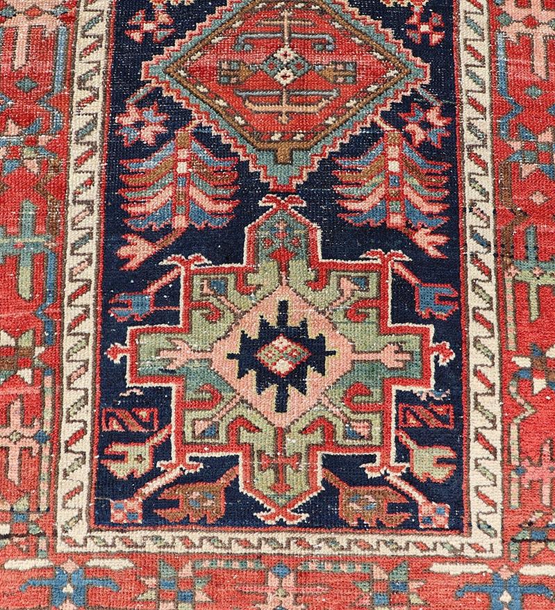 Antique Heriz Serapi Runner with Colorful Highly Stylized Medallion Design In Good Condition For Sale In Atlanta, GA