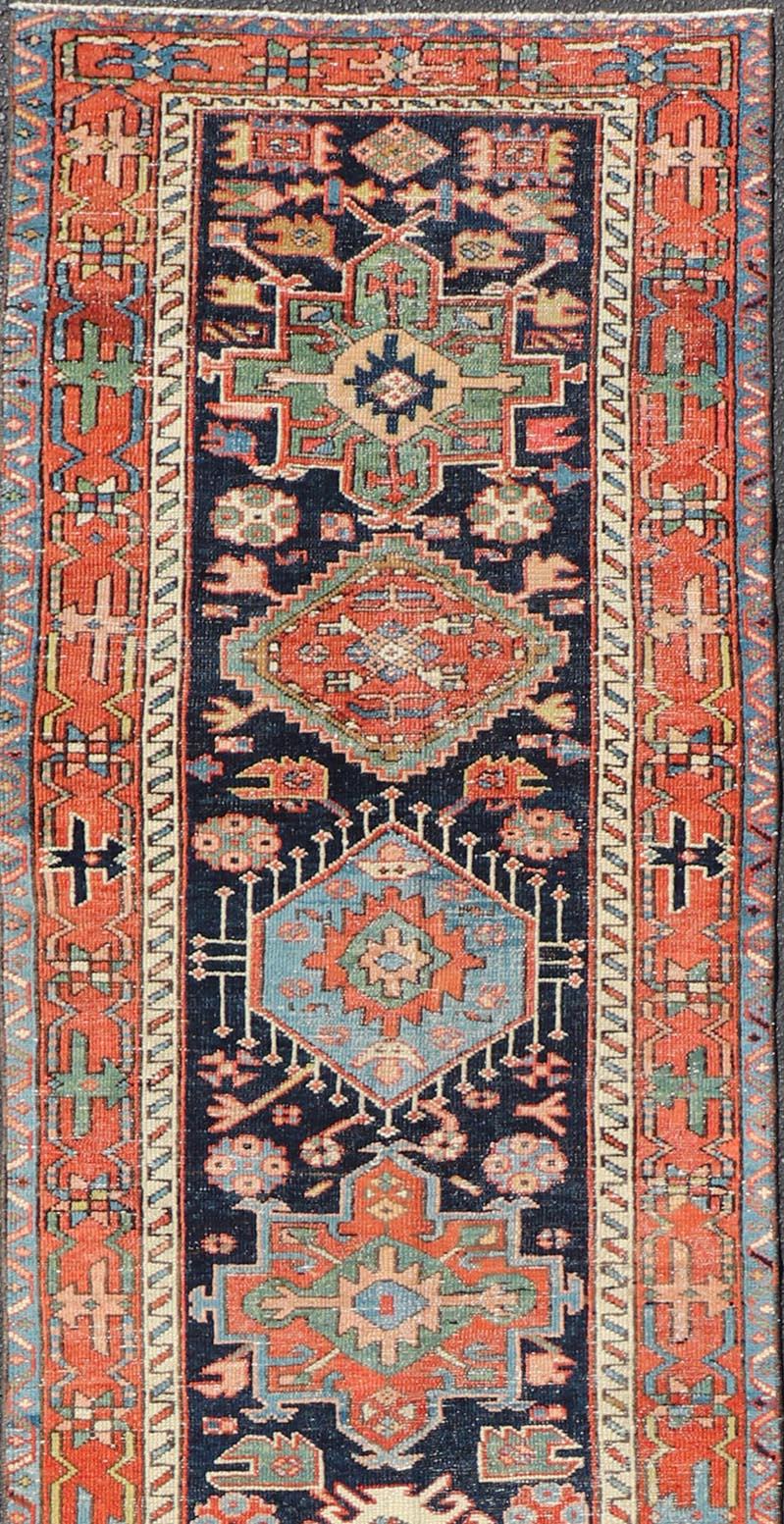 20th Century Antique Heriz Serapi Runner with Colorful Highly Stylized Medallion Design For Sale