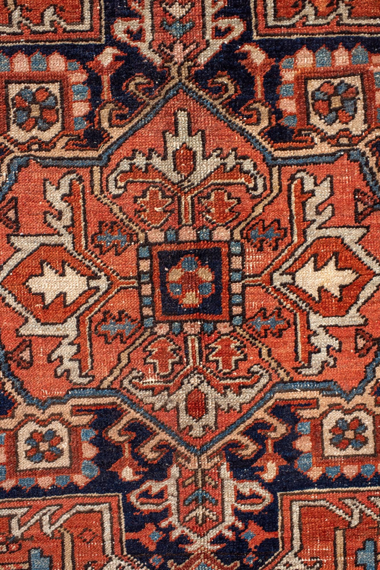 Hand-Knotted Antique Heriz with Dramatic Medallion and Deep Indigo Border For Sale