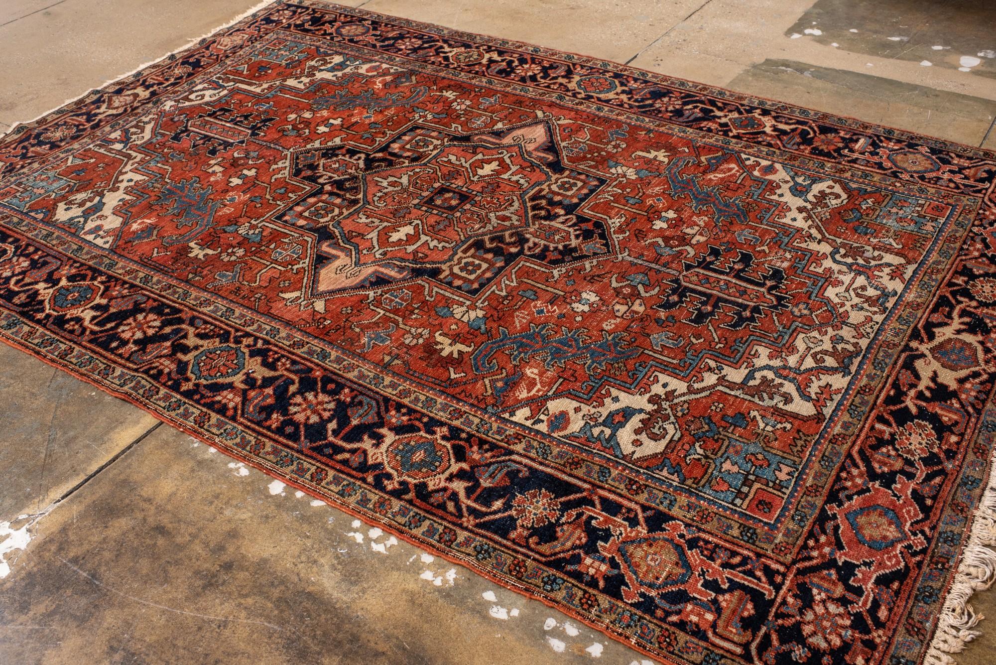 20th Century Antique Heriz with Dramatic Medallion and Deep Indigo Border For Sale