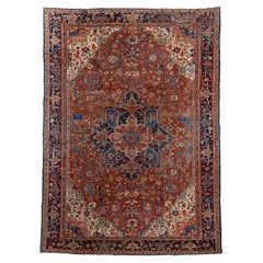 Antique Heriz with Red Field and Patterns of Flowers and Leaves, 1930's