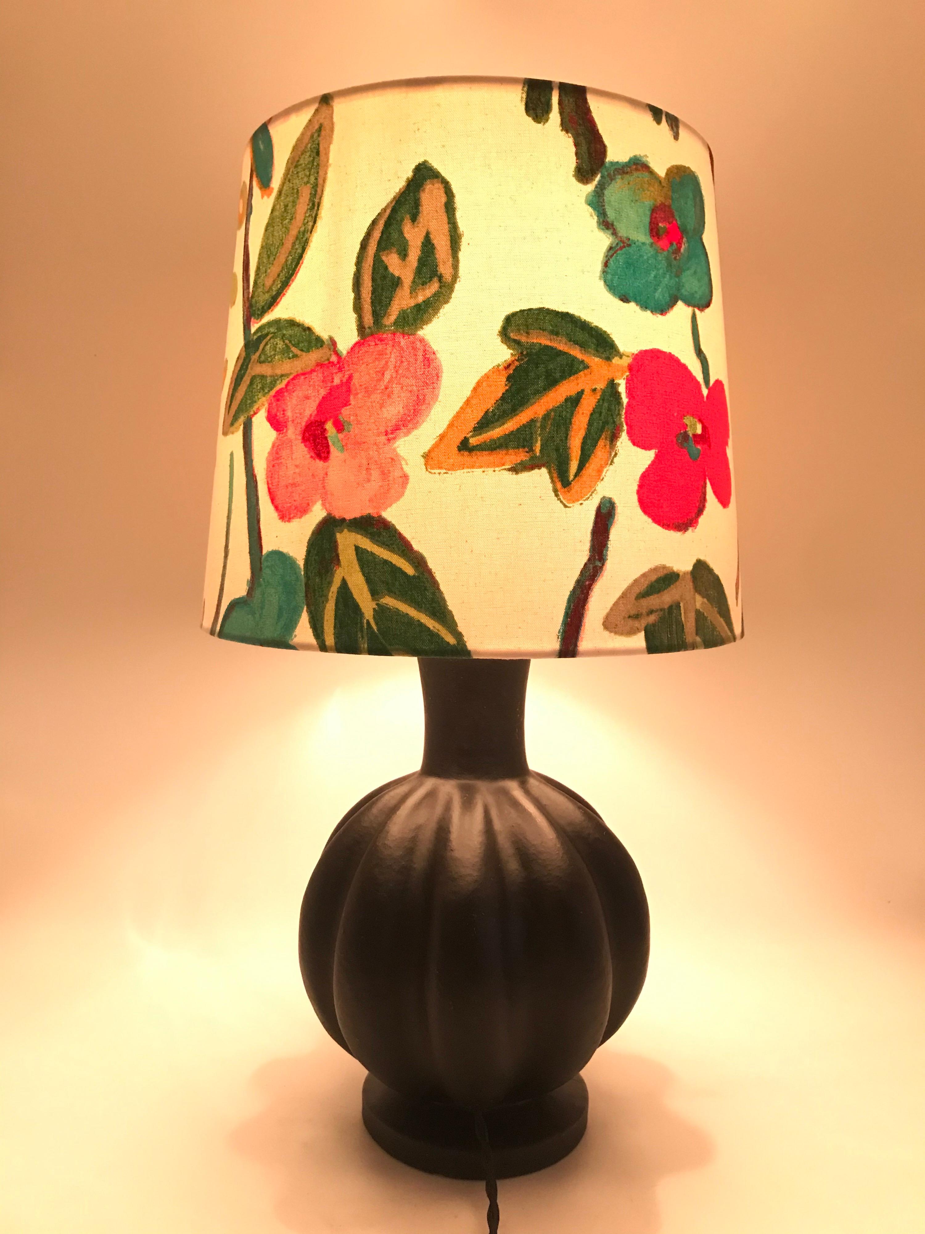 Antique Herman A. Kähler HAK painted pottery lamp from the 1920s
Original label still on the base.
Rewired and ready to plug in.
Can be fitted with a US or EU plug.
One repair to the base.
Shade not included.