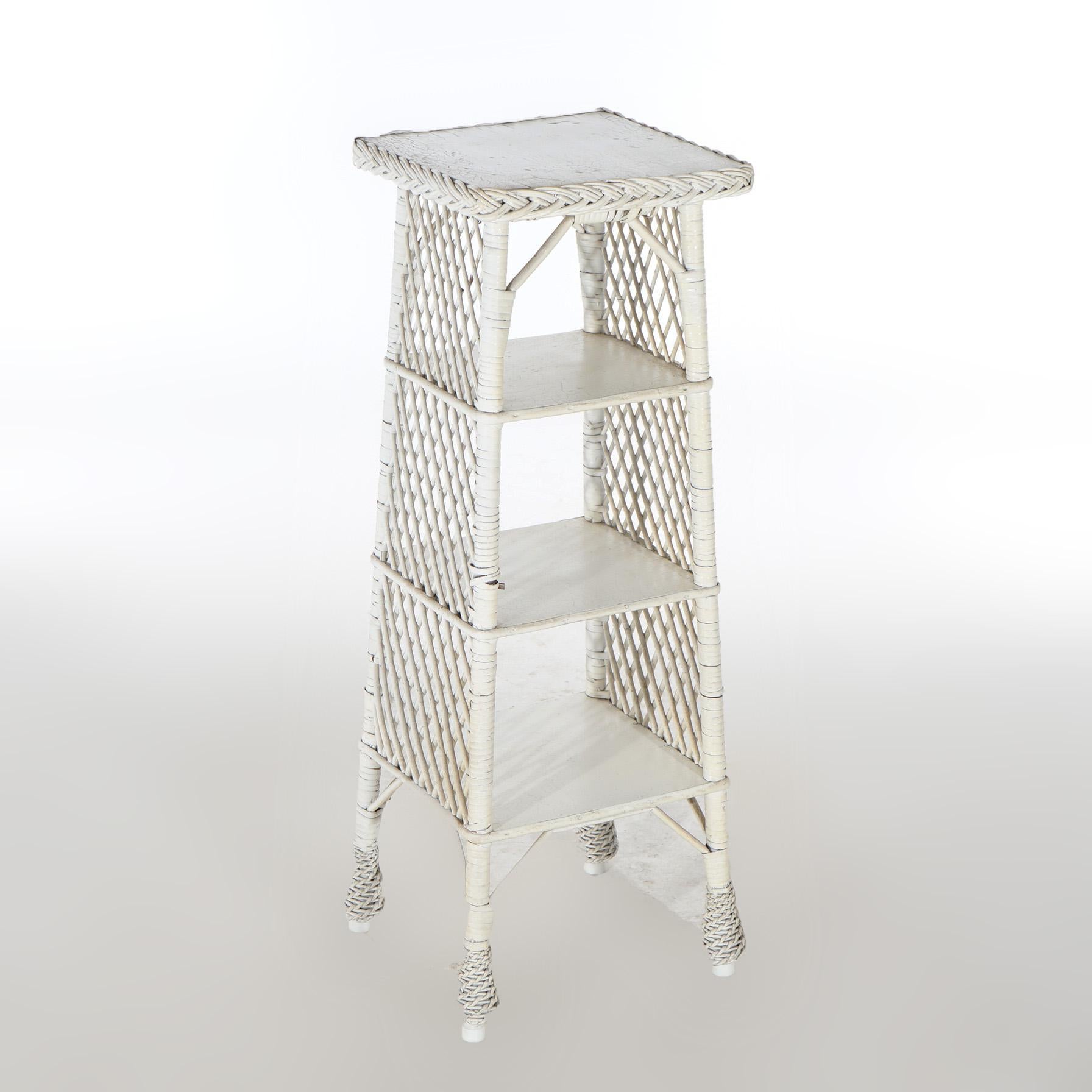 An Arts and Crafts Heywood Wakefield Bar Harbor White Painted Wicker Magazine Stand Circa 1915

Measures- 41.25''H x 15.25''W x 15''D
