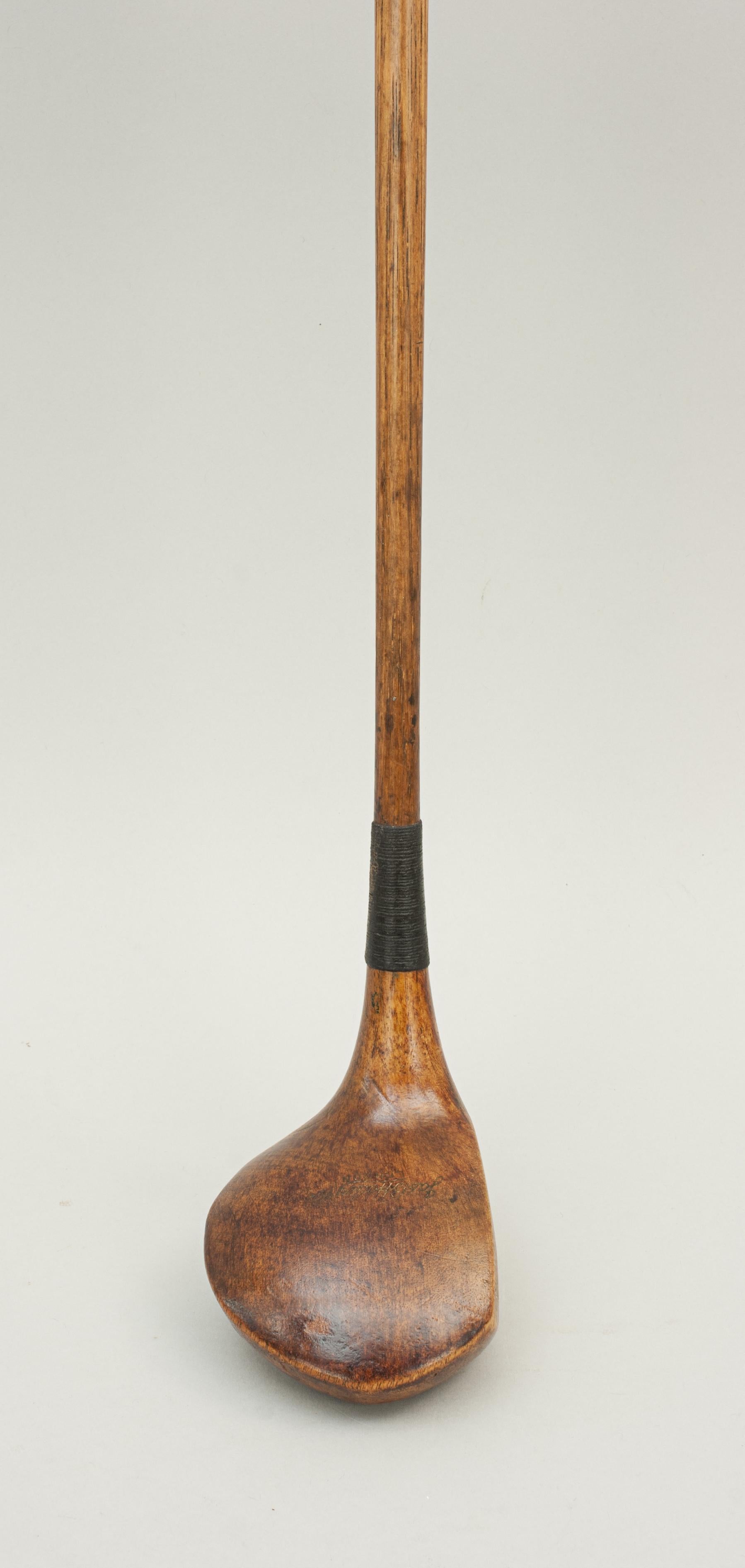 Golf Club, Hickory Driver, James B. Halley & Co.
A good persimmon wood driver by James B. Halley & Co. The club has a hickory shaft with a polished leather grip. The head is marked with 'Jas B. Halley & Co. London' and has a lead weight to the rear