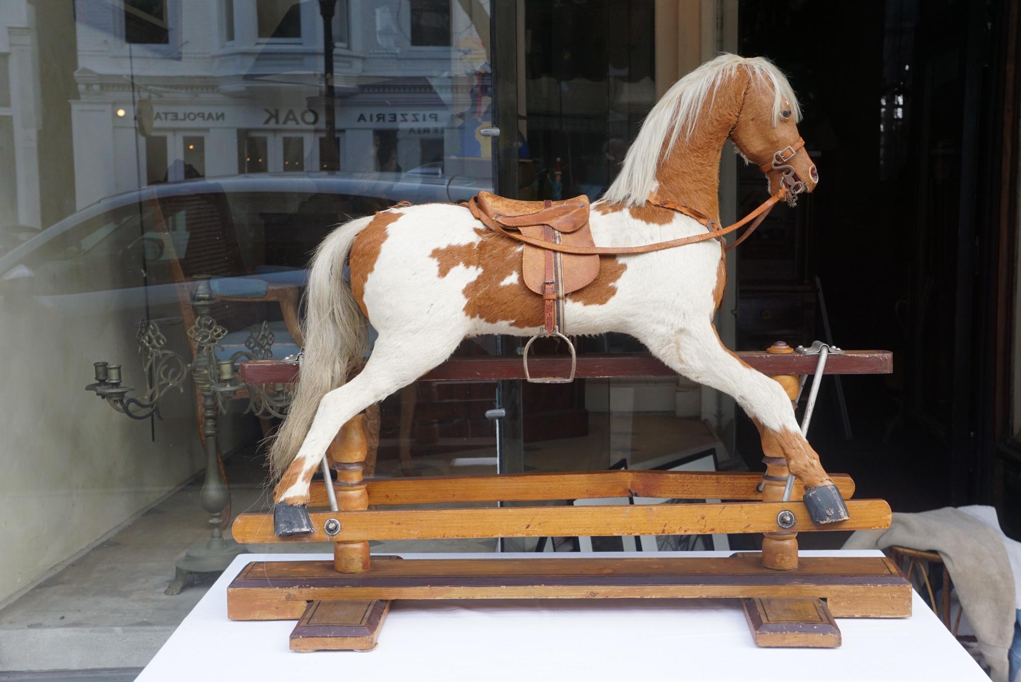 This rare survivor of the F. A. O. Schwarz Toy Bazaar comes from an early period in the firm's history. The labeled horse (see photo 7) was produced before 1889. The company was founded in 1862 by Fredric August Otto Schwarz in conjunction with his