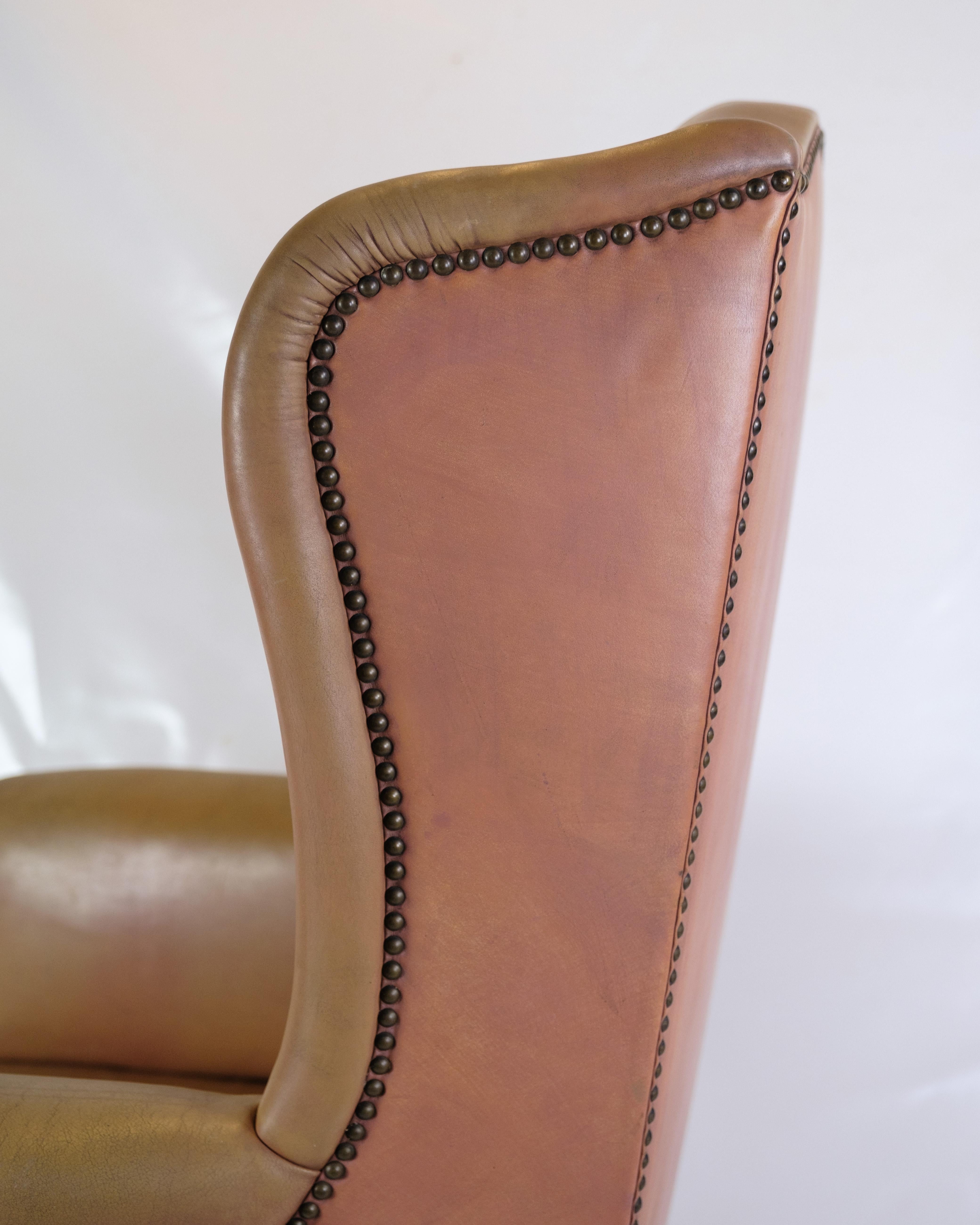 Danish Antique High Flap Chair, Chesterfield Style Made In Brown Leather From 1920s For Sale