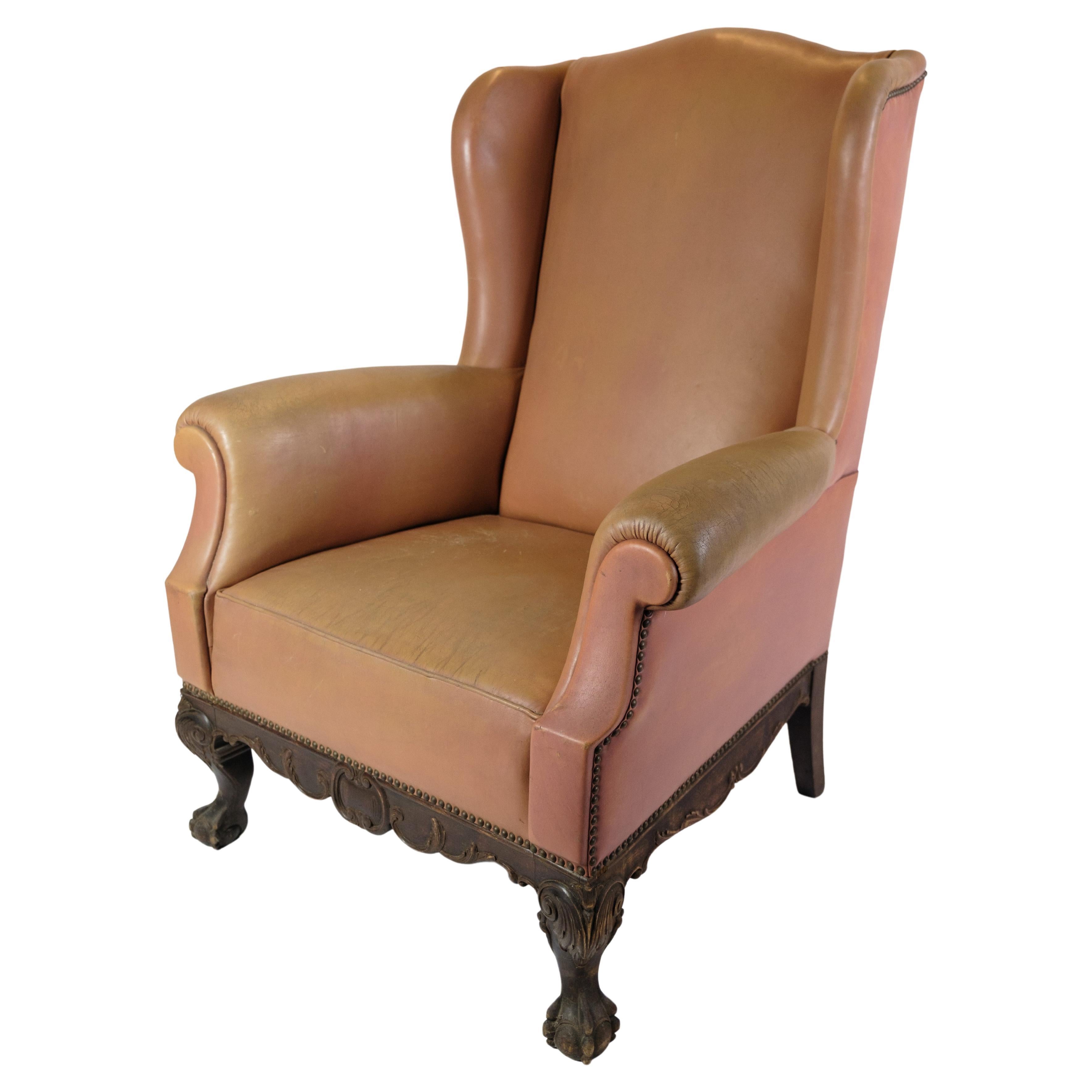Antique High Flap Chair, Chesterfield Style Made In Brown Leather From 1920s For Sale