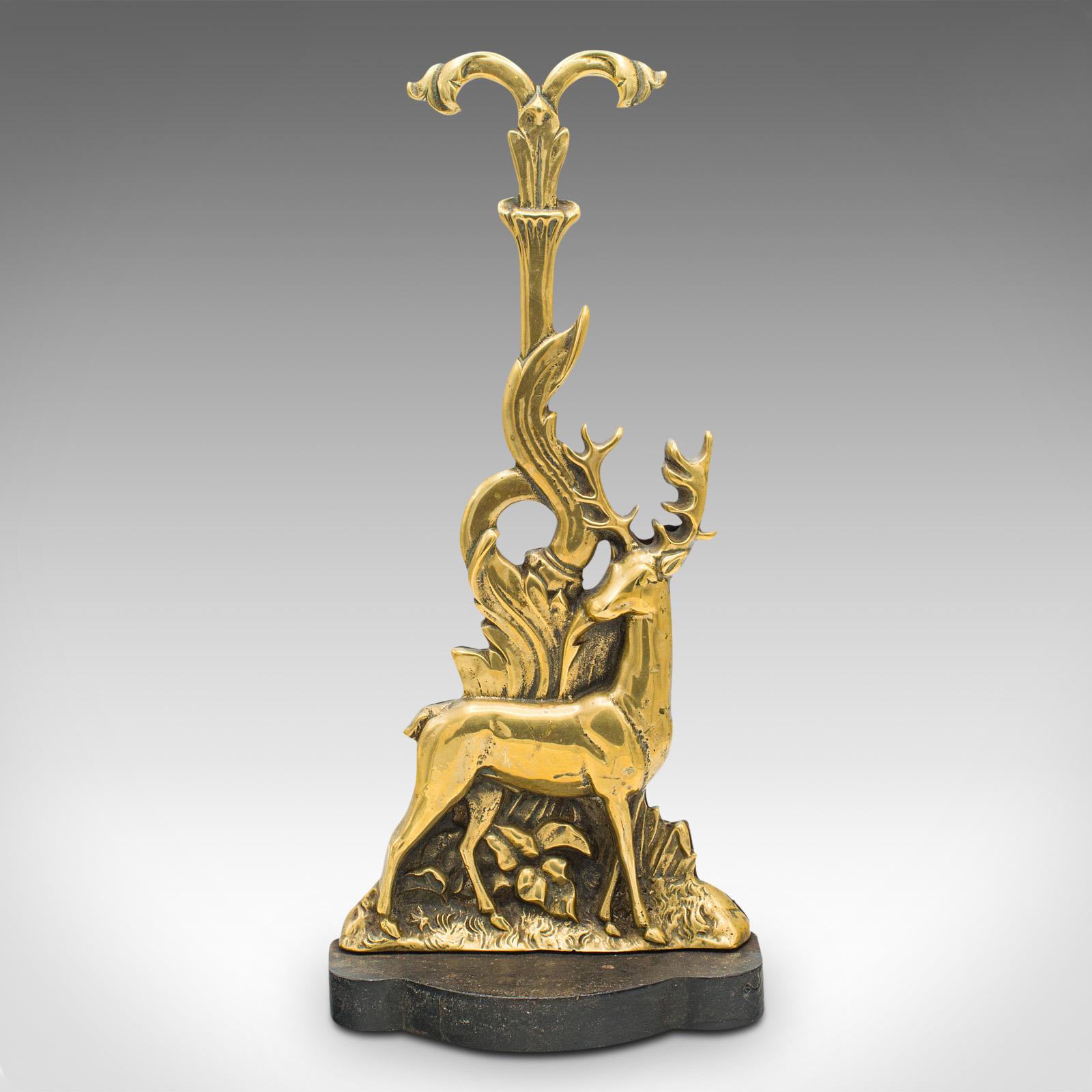 This is an antique Highland doorstop. A Scottish, brass and cast iron decorative door keeper with stag figure, dating to the mid Victorian period, circa 1870.

Delightful doorstop, proudly presenting Scottish taste and theme
Displays a desirable
