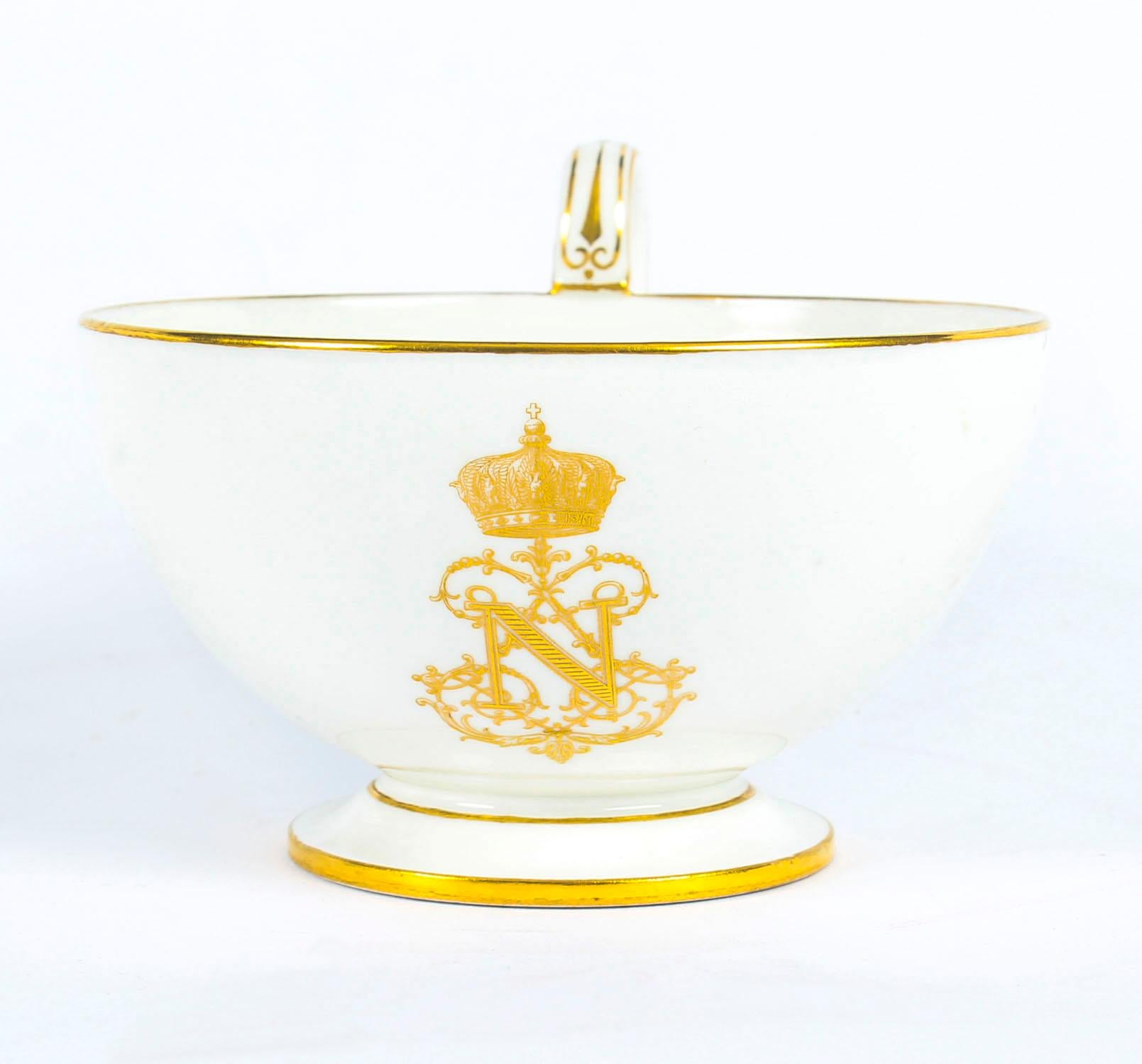 This is an important fine Sèvres Porcelain breakfast cup and saucer with gilt crowned N cipher and gilt line borders on white ground, bearing the red Imperial crowned N Sèvres mark and date letter for 1859.

This is sure to be a treasured addition