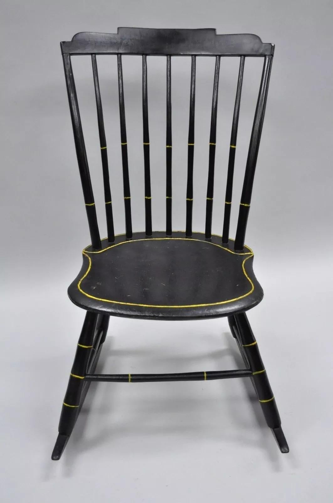 Antique Hitchcock Style Child's Black Bow Back Windsor Rocker Rocking Chair. Item features nice black & gold finish, child's size, solid wood construction, quality American craftsmanship. Circa Early 20th Century. Measurements: 32