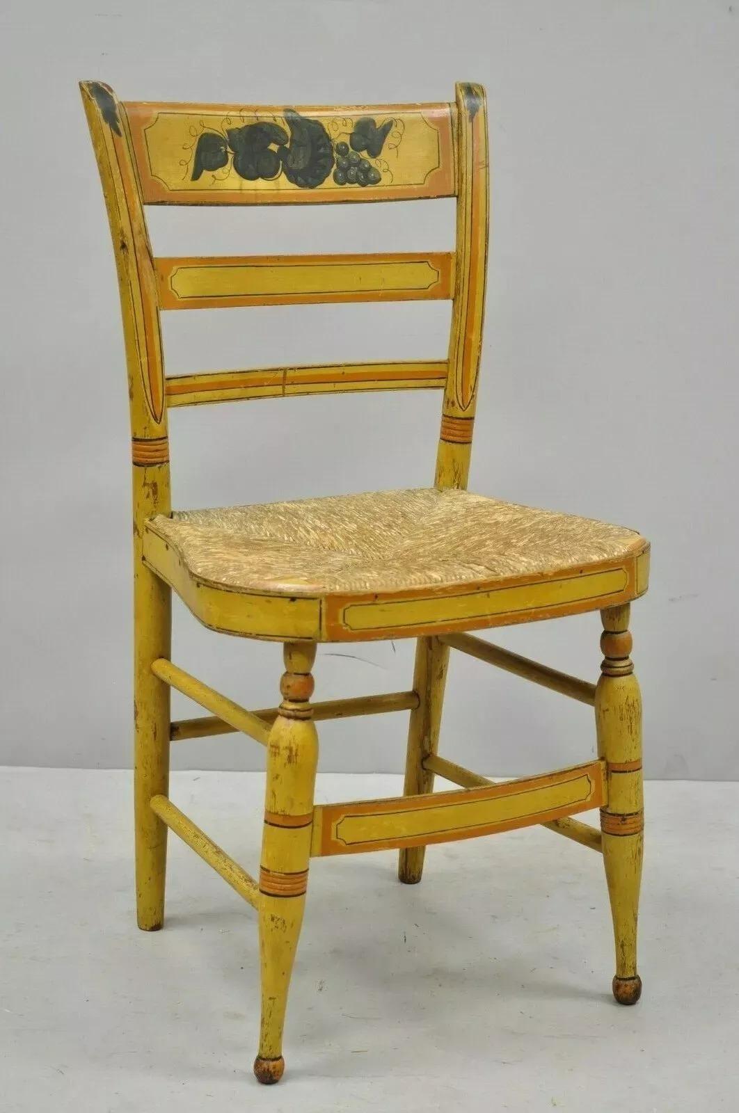 Antique Hitchcock Style Slat Back Rush Seat Yellow Paint Stencil Side Chair (B). Item features woven rush seat, hand painted frame, green, yellow and, orange finish, very nice antique item, quality American craftsmanship. Circa Late 19th Century.