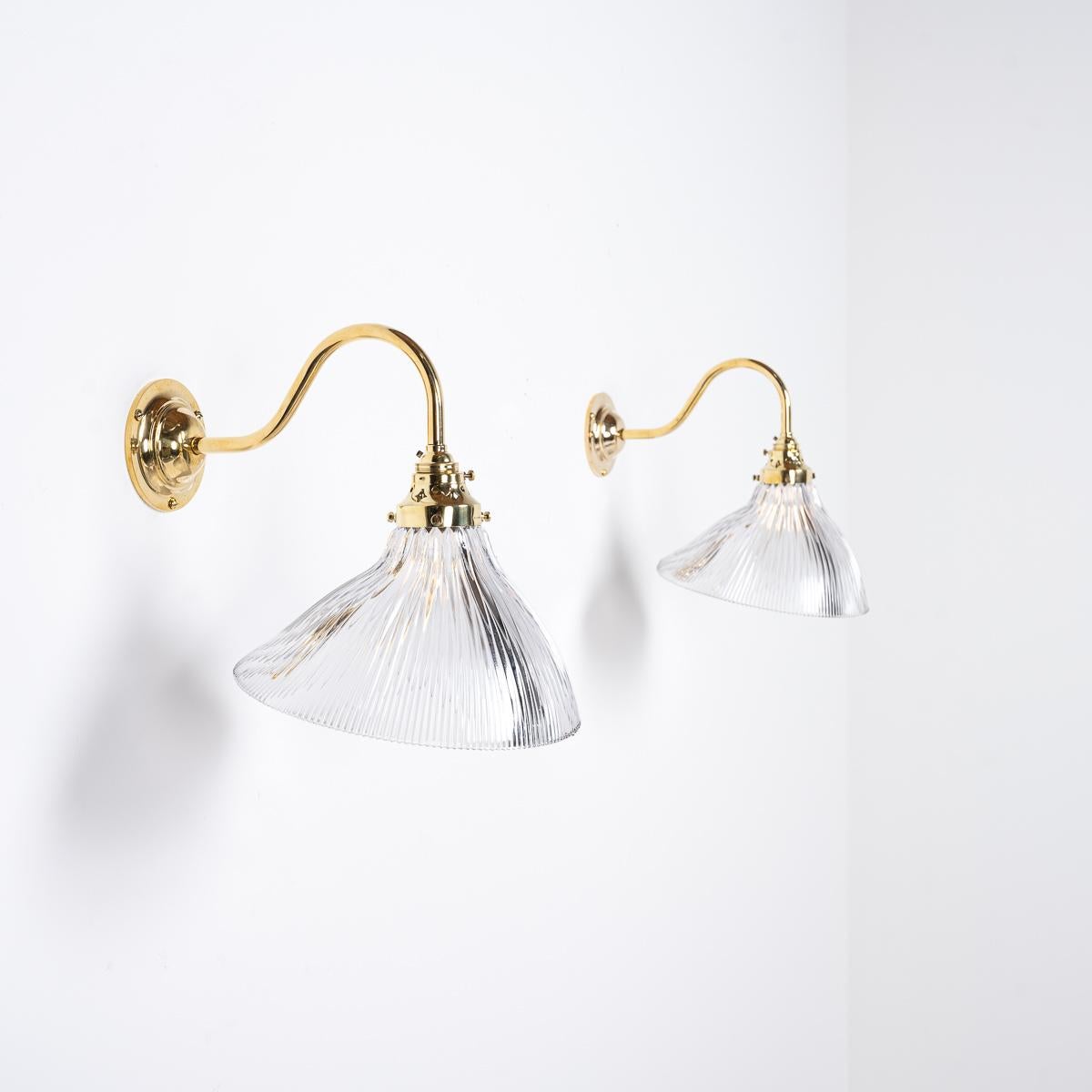 Mid-20th Century Antique Holophane Angled Prismatic Glass Wall Lights on Polished Brass Brackets For Sale