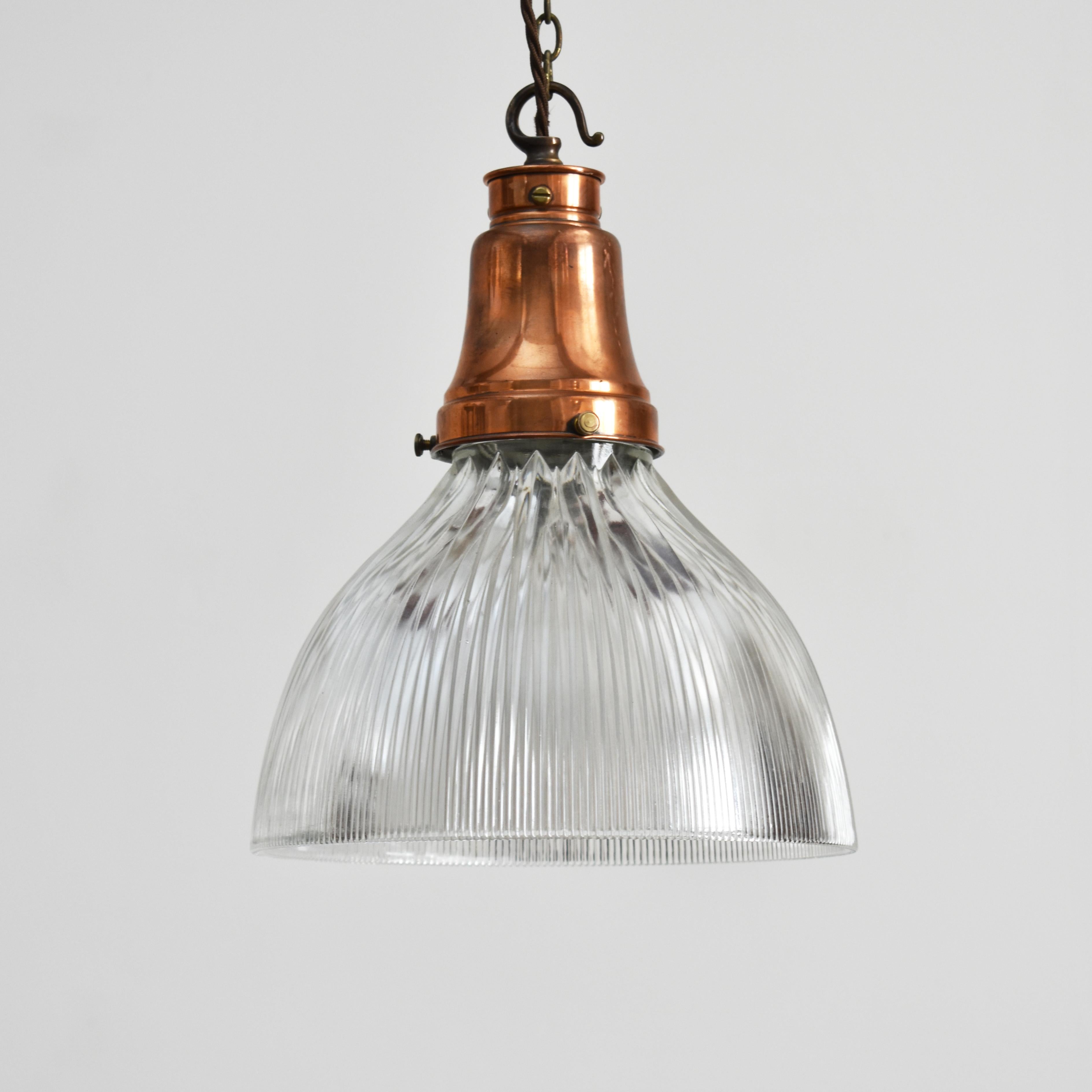 Antique Glass Holophane Pendant Light

A vintage bell pendant glass light Manufactured by ‘Holophane’. The glass prismatic shade looks great both lit and unlit. The light has retained its original copper GEC gallery.

Dimensions:
Height: