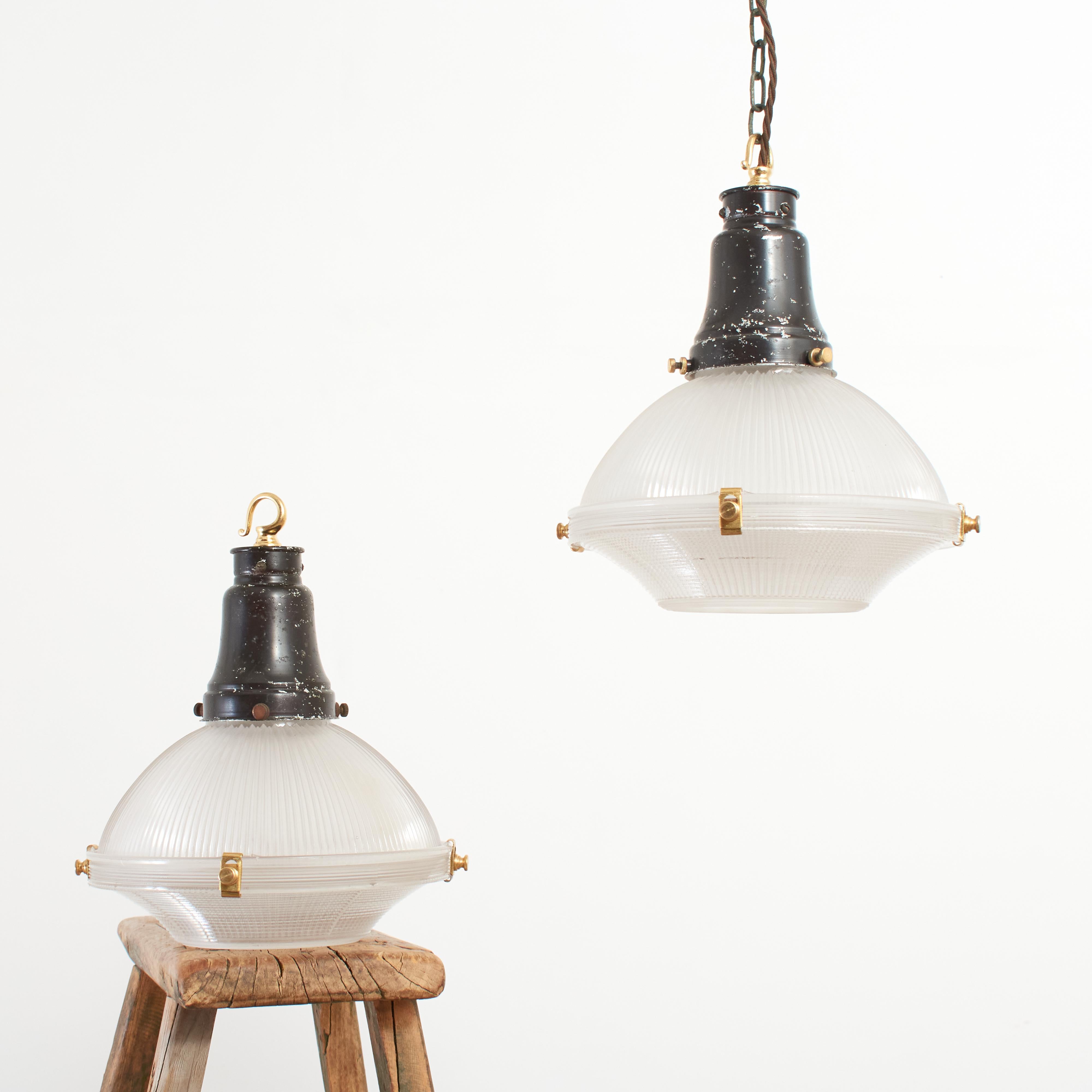 Antique Holophane 2 Part Reflector Pendant Light – C

An original Holophane ‘Reflector Refractor’ glass pendant light retaining its original gallery and components. The metalwork has been left in its original condition. This 2 part type glass