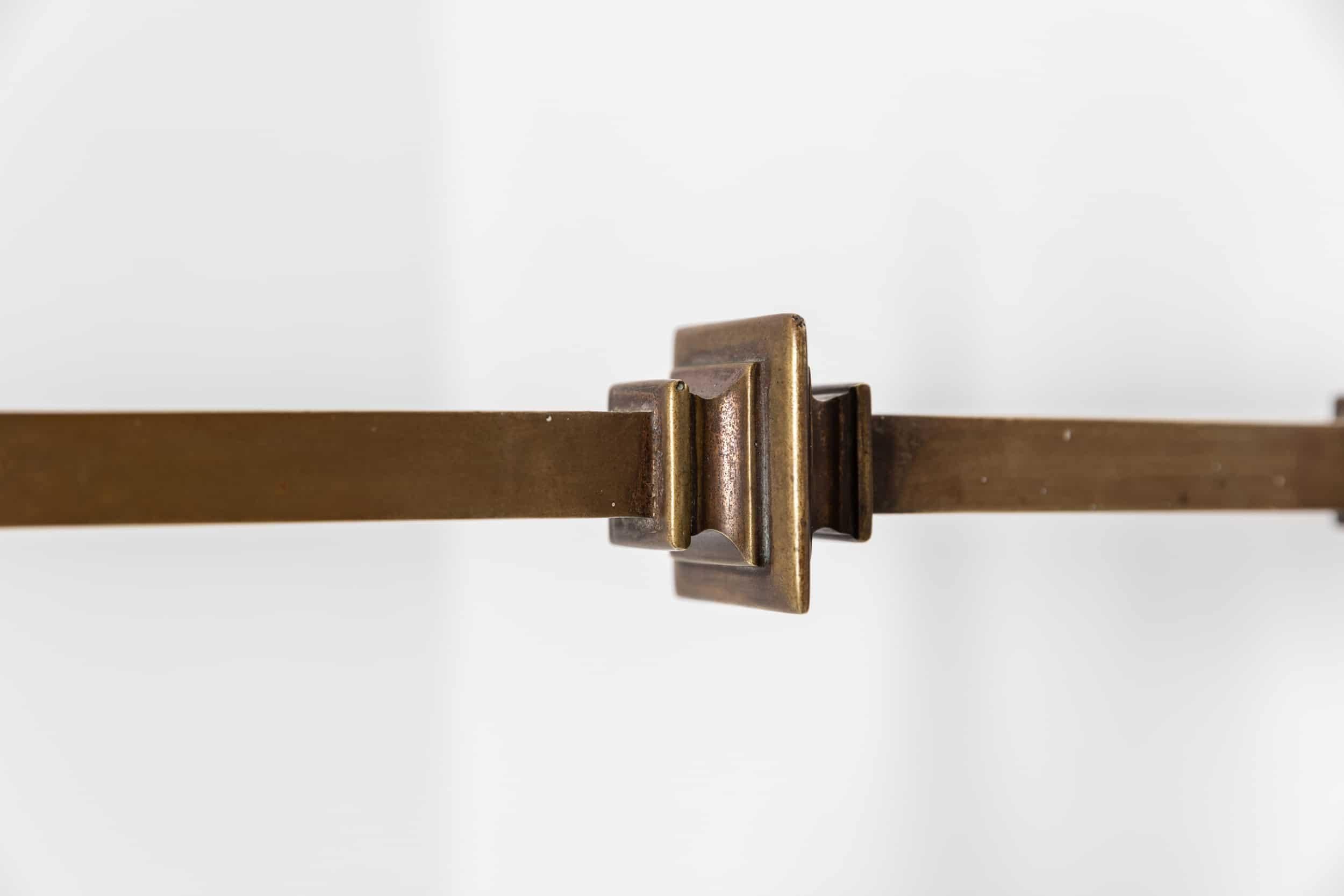 A stunning wall brass wall lamp of squared form. c.1920

Made by GEC, the wall arm is made entirely of brass, paired with a proportional 6