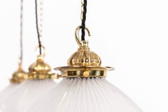 Antica lampada a sospensione in vetro prismatico con riflettore e rifrattore Holophane, 1920 ca.