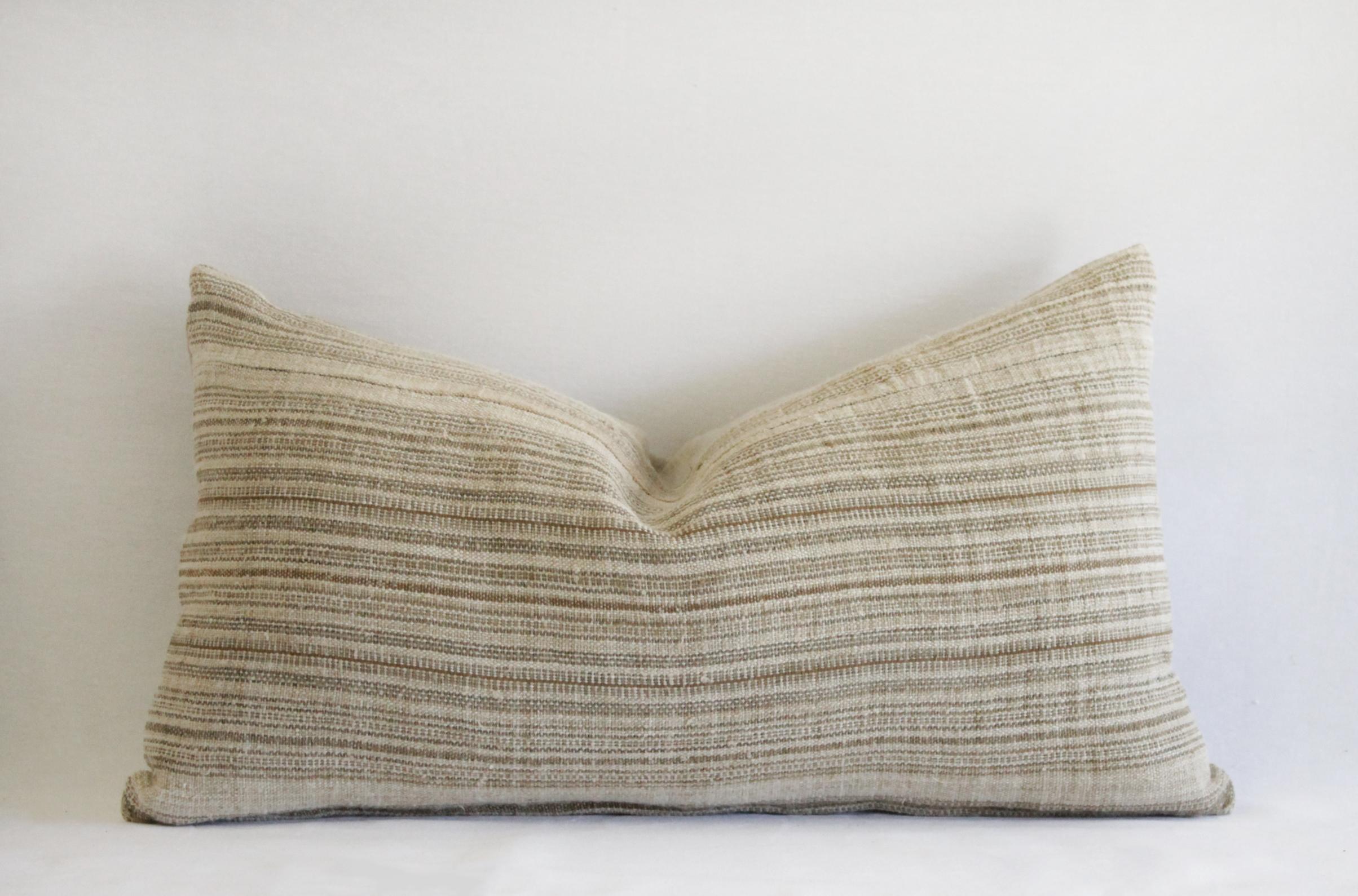 Antique Homespun linen pillows in natural and brown stripe.
Custom made from antique textiles, these pillows are so beautiful with a natural background color, and tonal brown stripes. Backing is a flax Belgian linen.
Hidden zipper closure, insert