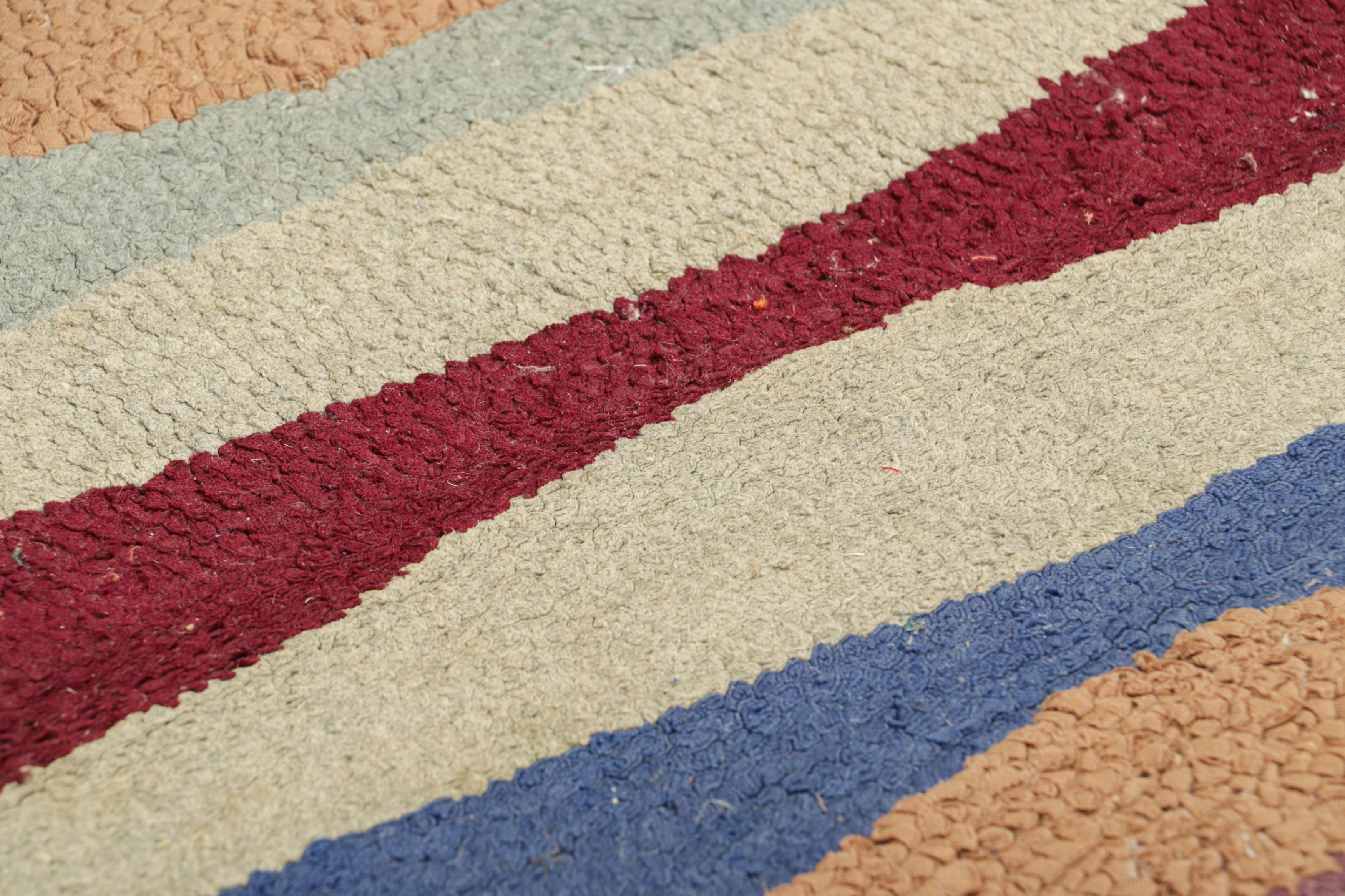 Handmade in wool and originating circa 1920-1930, this 2x4 rug is a rare and exciting new curation in Rug & Kilim’s collection of antique hooked rugs.

On the Design: 

This collectible piece enjoys geometric patterns in a polychromatic colorway,