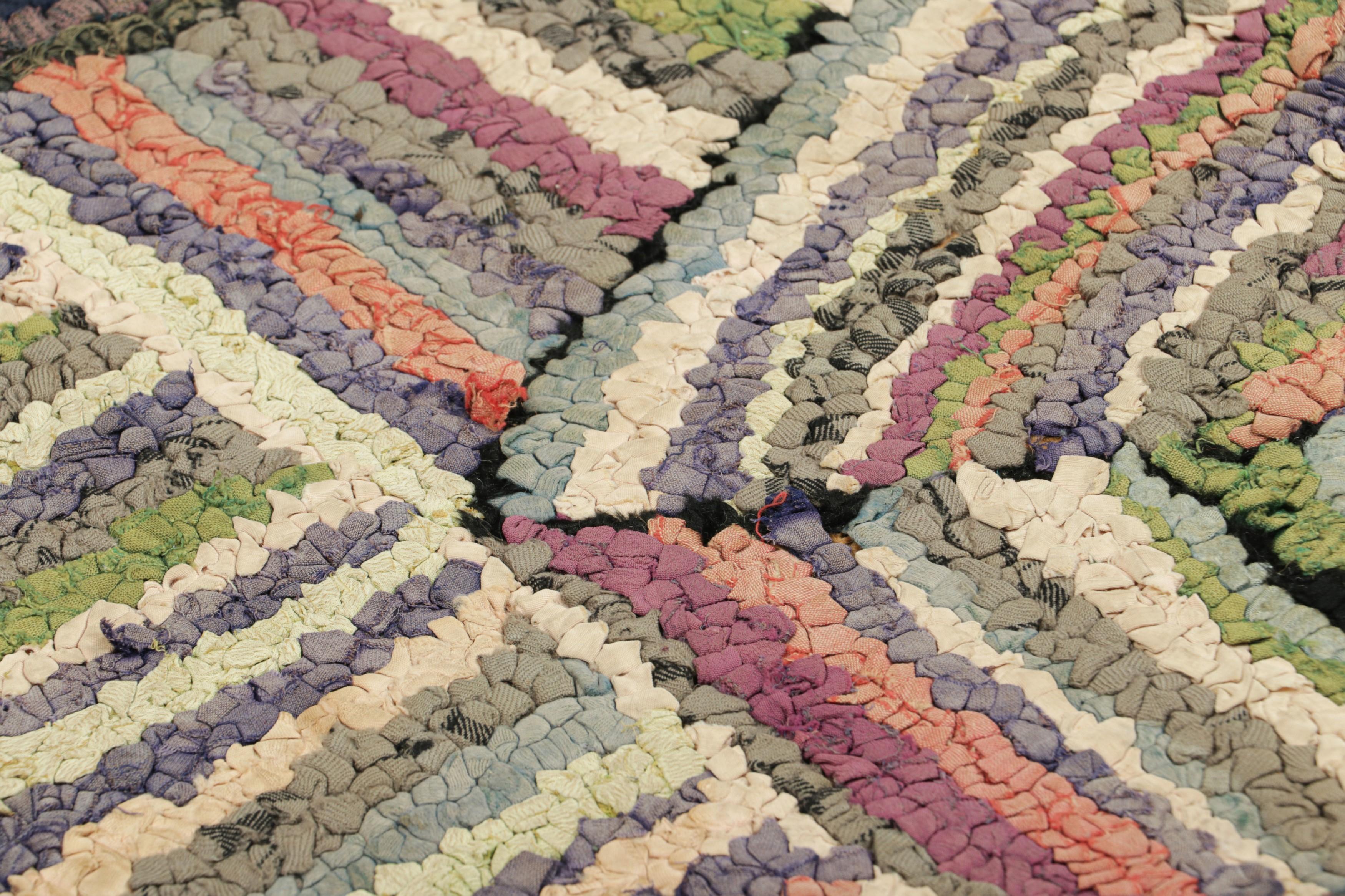 Handmade in wool and originating circa 1920-1930, this 2x3 antique rug is a rare and exciting new curation in Rug & Kilim’s collection of American hooked rugs.

On the Design: 

Admirers of the craft will note this piece is a special find among some