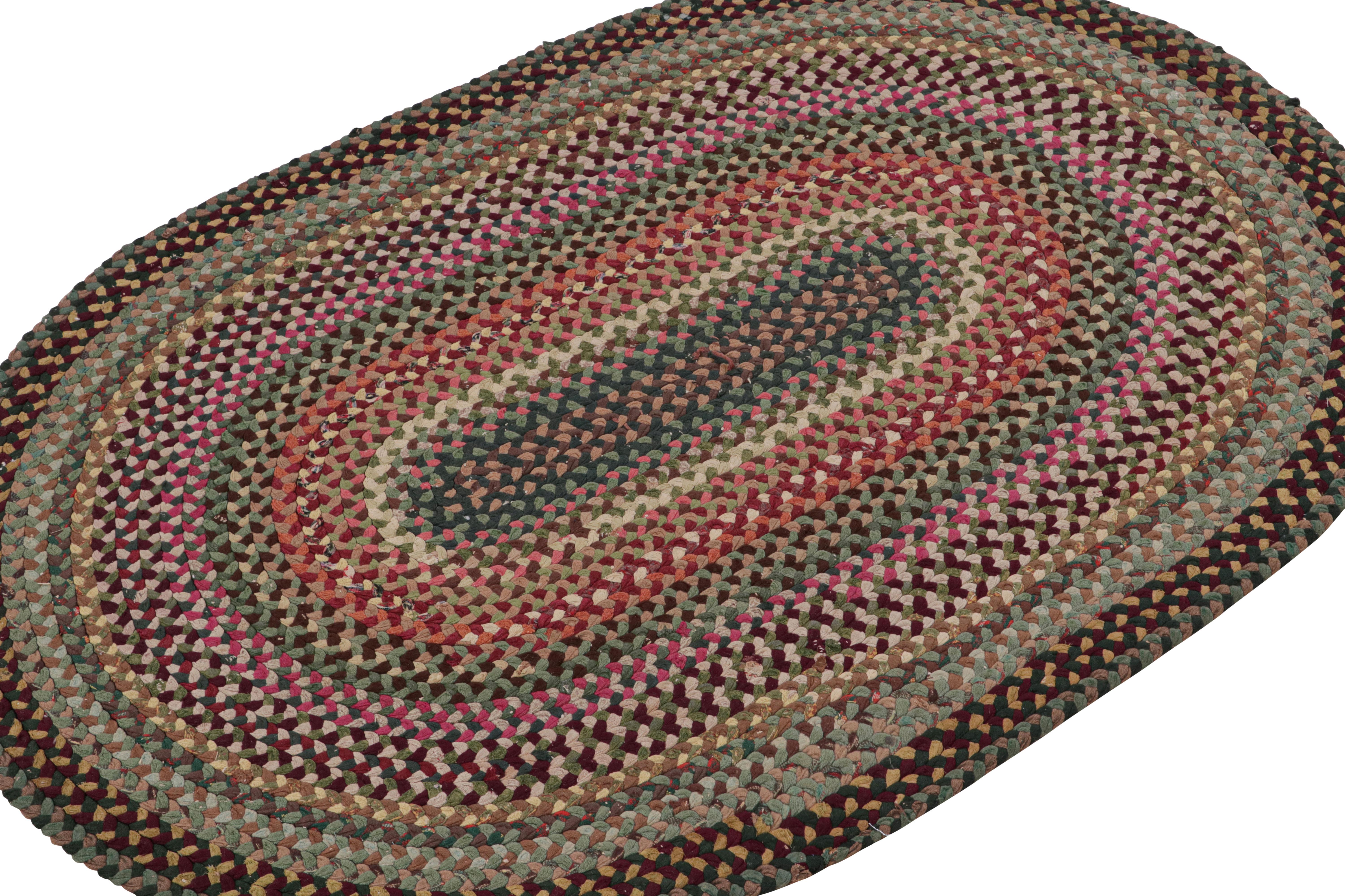 A rare 3x4 antique hooked oval rug of United States’ provenance, handmade in braided wool and fabric circa 1920-1930 with polychromatic stripes in a braided style. 

On the Design: 

Admirers of the craft will note the intricate pattern and color