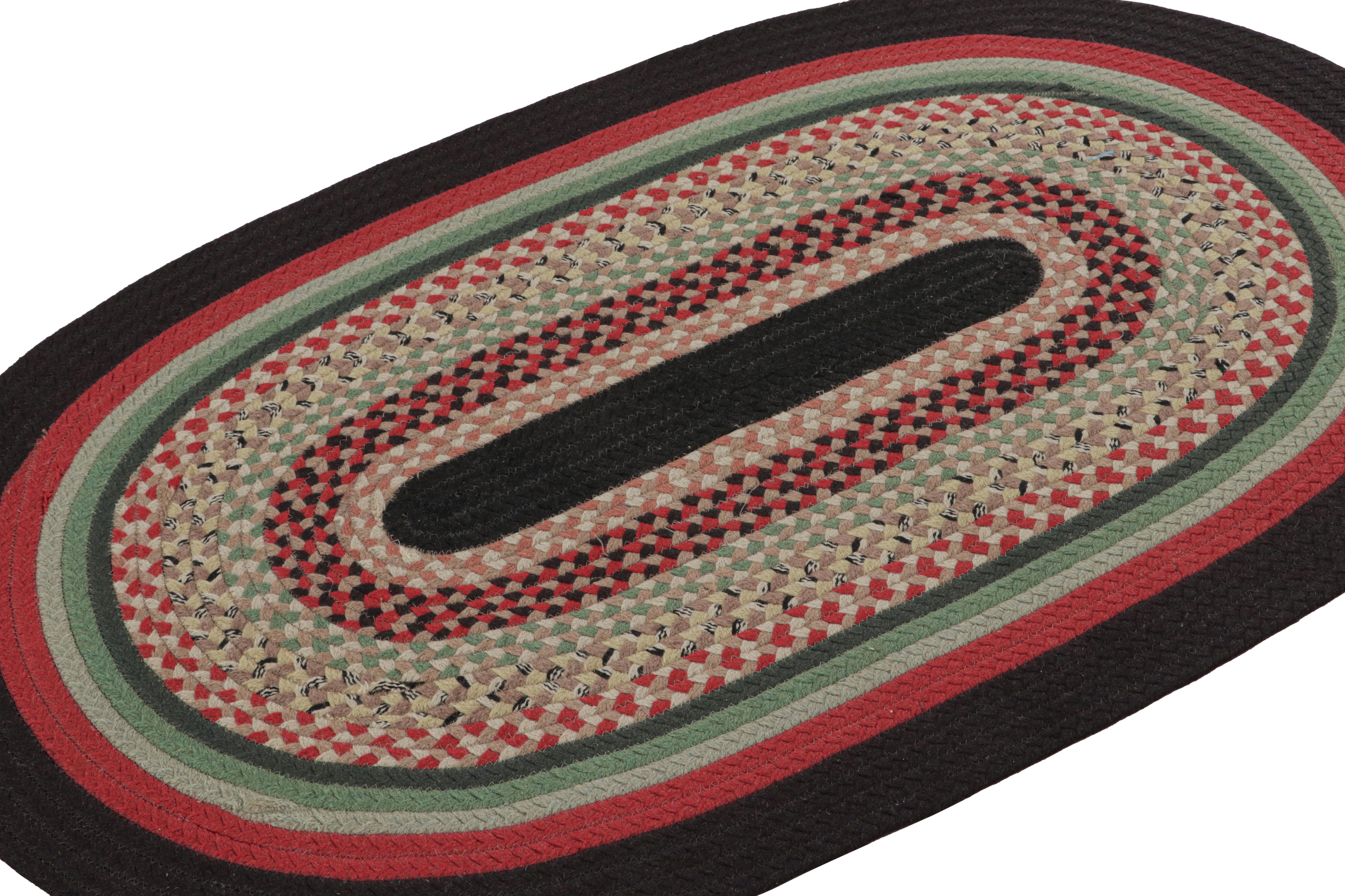 A rare 3x5 antique hooked oval rug of United States’ provenance, handmade in braided wool and fabric circa 1920-1930 with polychromatic stripes in a braided style. 

On the Design: 

Admirers of the craft will note the intricate pattern and color