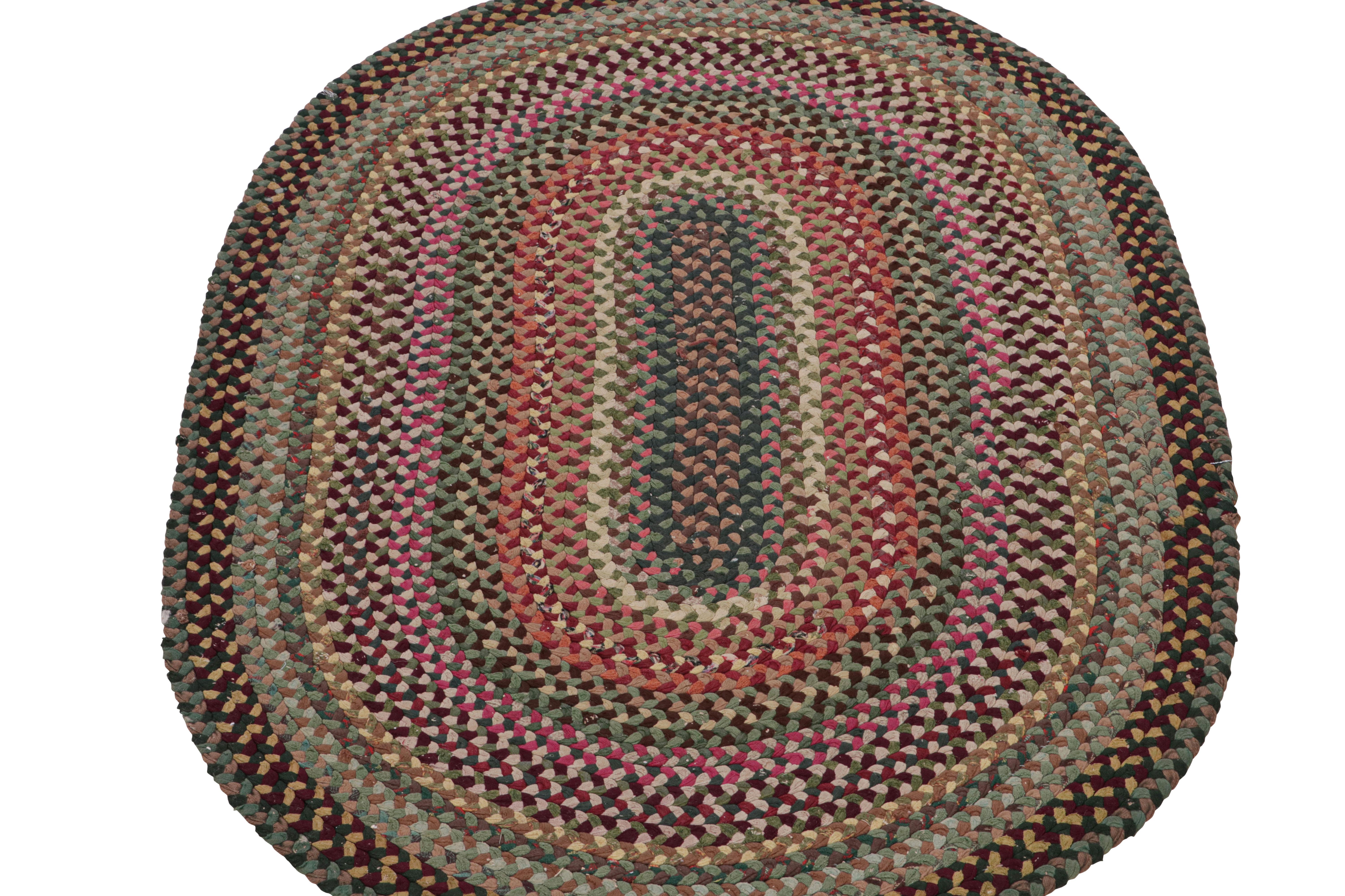 American Antique Hooked Oval Rug with Polychromatic Braided Stripes, from Rug & Kilim For Sale