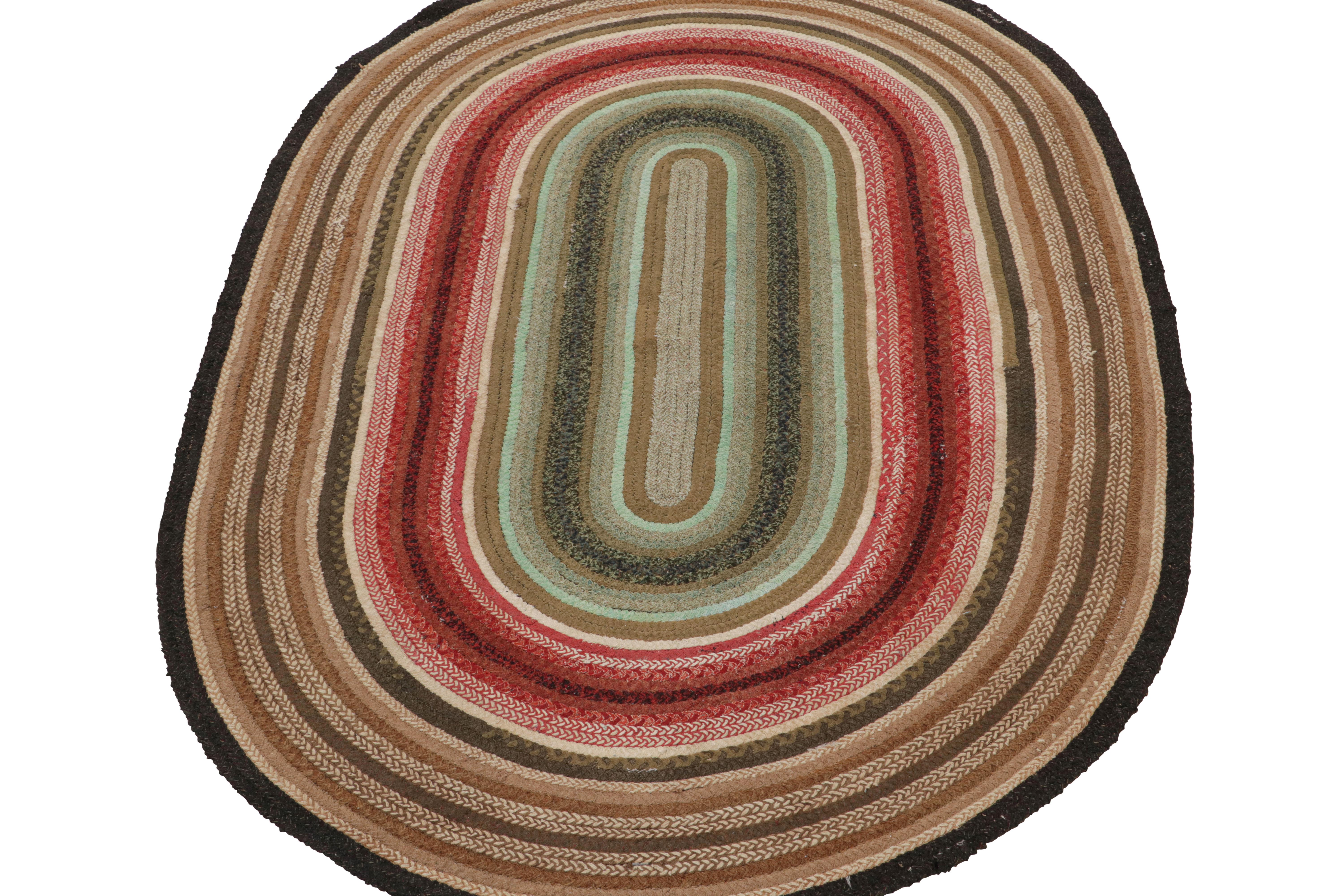 American Antique Hooked Oval Rug with Polychromatic Braided Stripes, from Rug & Kilim For Sale