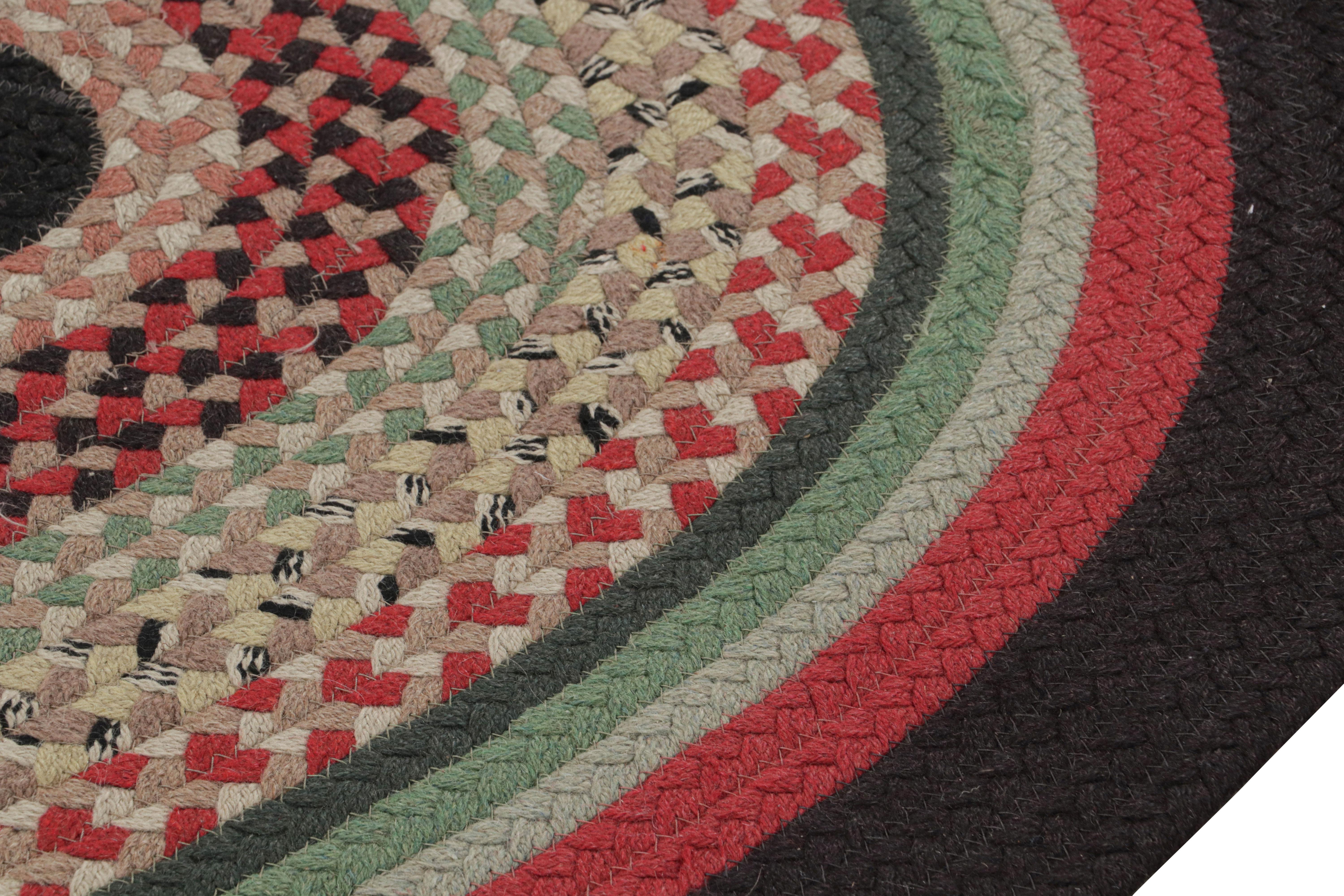 Early 20th Century Antique Hooked Oval Rug with Polychromatic Braided Stripes, from Rug & Kilim