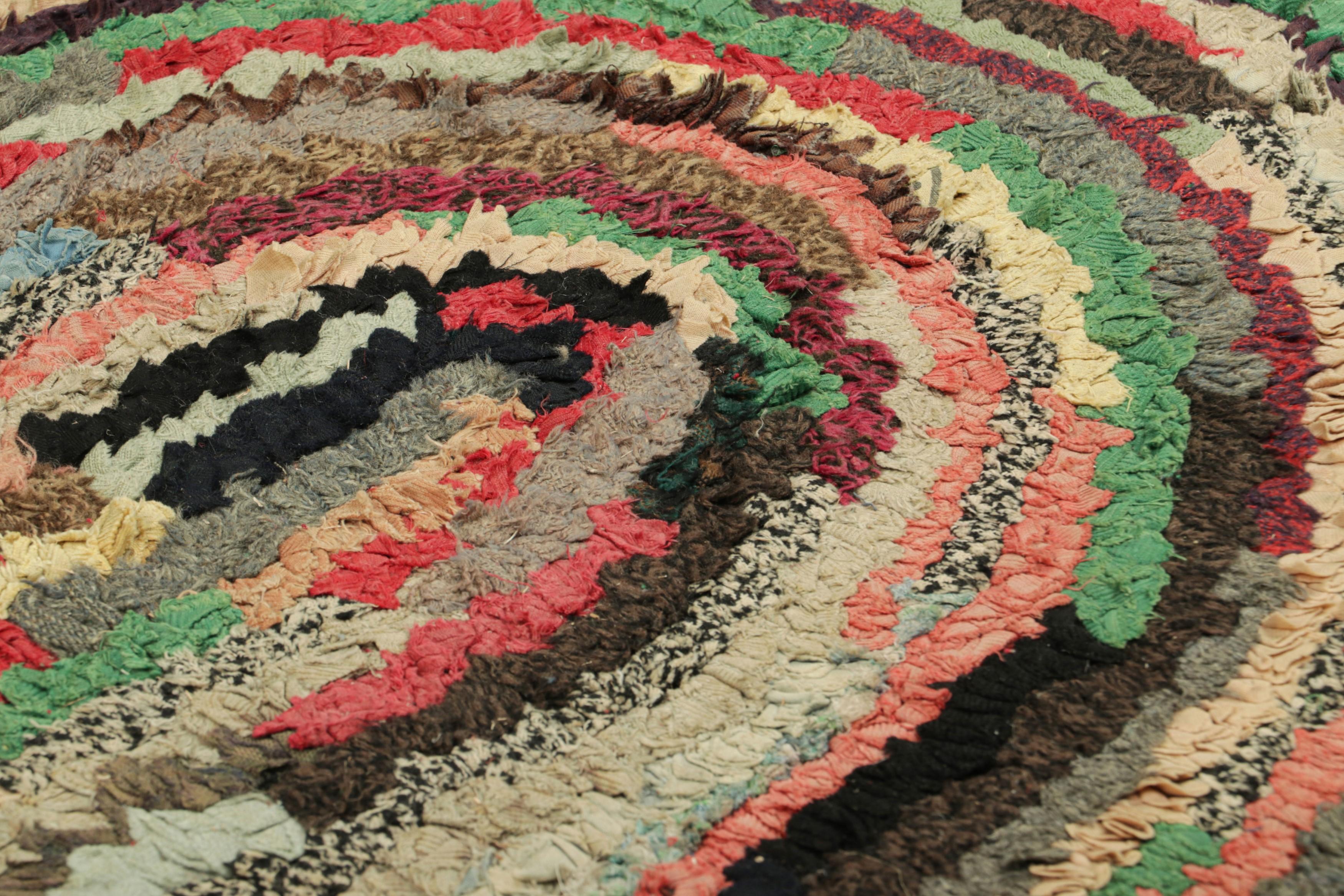 Handmade in wool and originating circa 1920-1930, this 3x3 antique circle rug is a rare and exciting new curation in Rug & Kilim’s collection of American hooked rugs. 

On the Design: 

Admirers of the craft will note this piece is a special find