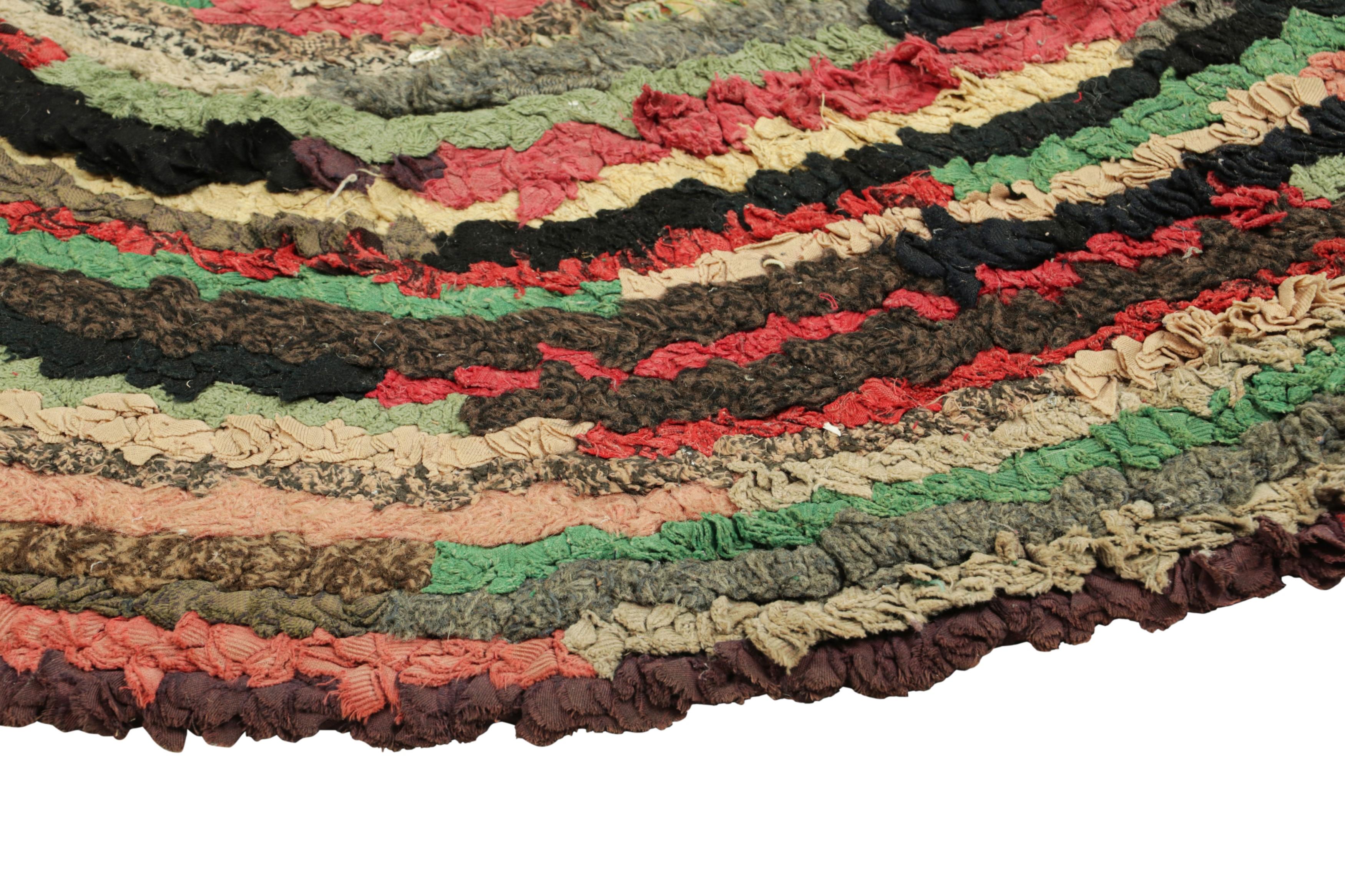 Early 20th Century Antique Hooked Oval Rug with Polychromatic Geometric Patterns  Rug & Kilim For Sale