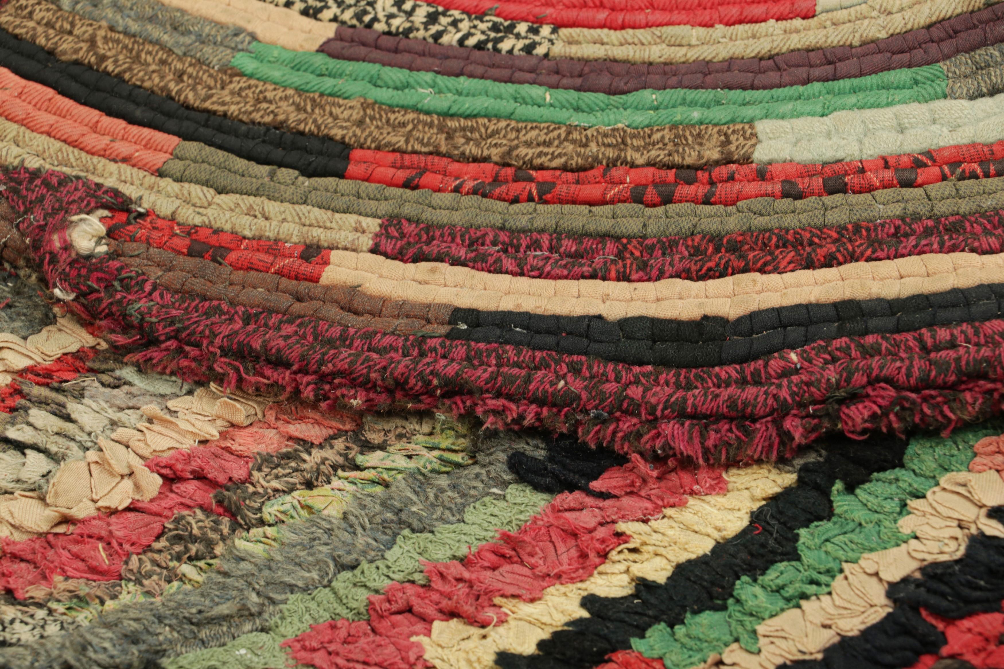 Wool Antique Hooked Oval Rug with Polychromatic Geometric Patterns  Rug & Kilim For Sale
