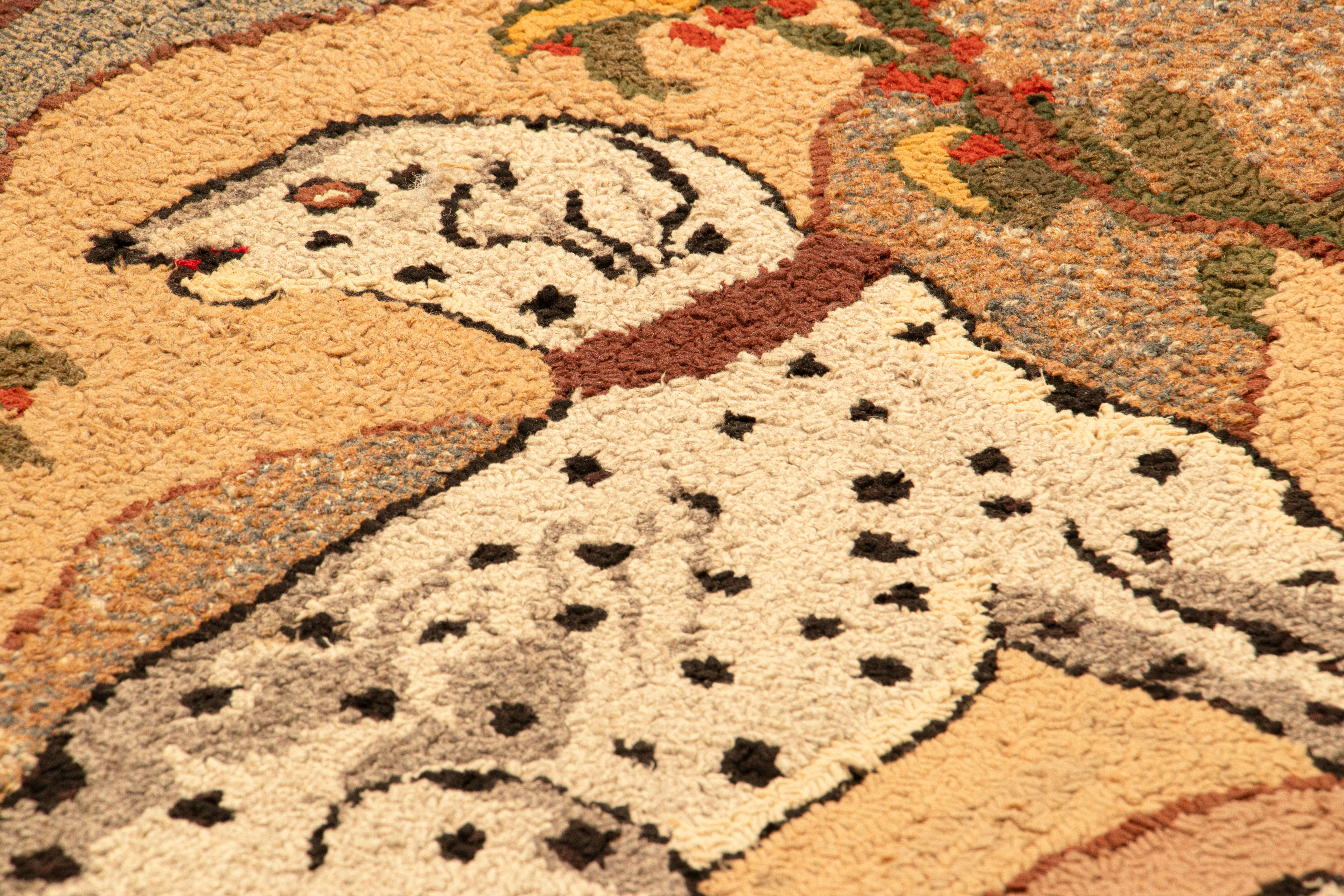 This 2x3 antique hooked rug is an exceptional addition to Rug & Kilim's collection of American hooked rugs and folk art designs—an exemplar of early 20th century pictorial animal imagery, made with hand-hooked wool and originating within the United