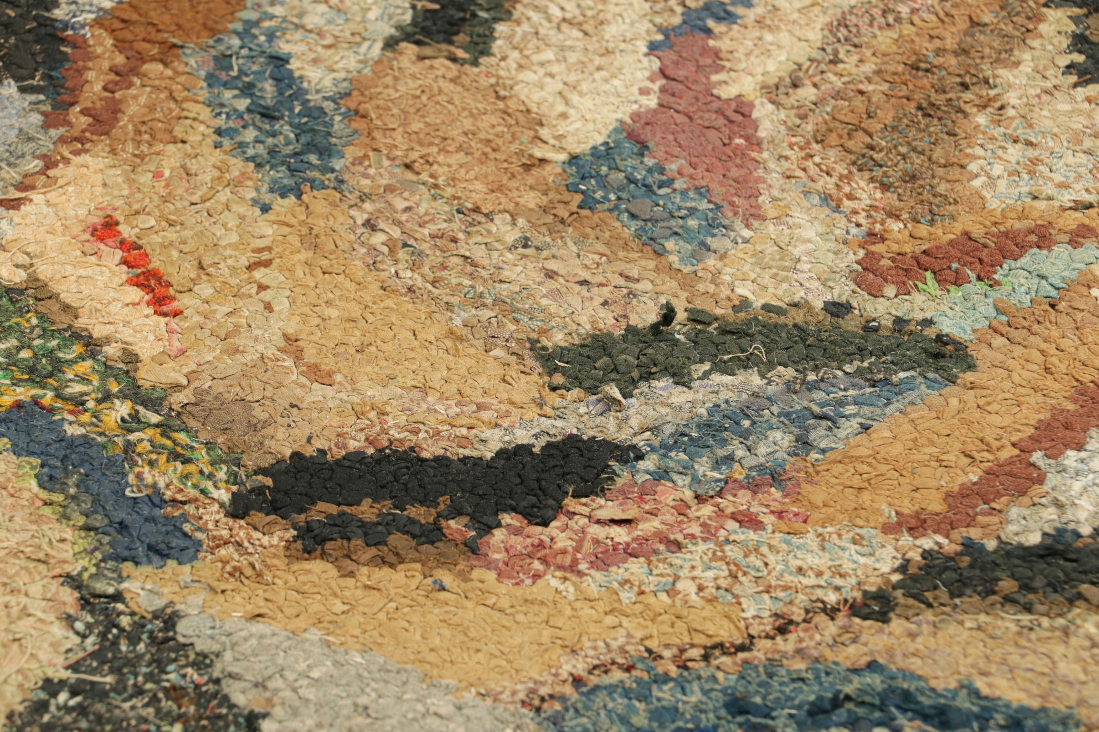 Handmade in wool and originating circa 1920-1930, this 2x3 antique rug is a rare and exciting new curation in Rug & Kilim’s collection of American hooked rugs.

On the Design: 

Admirers of the craft will note this piece is a special find among some