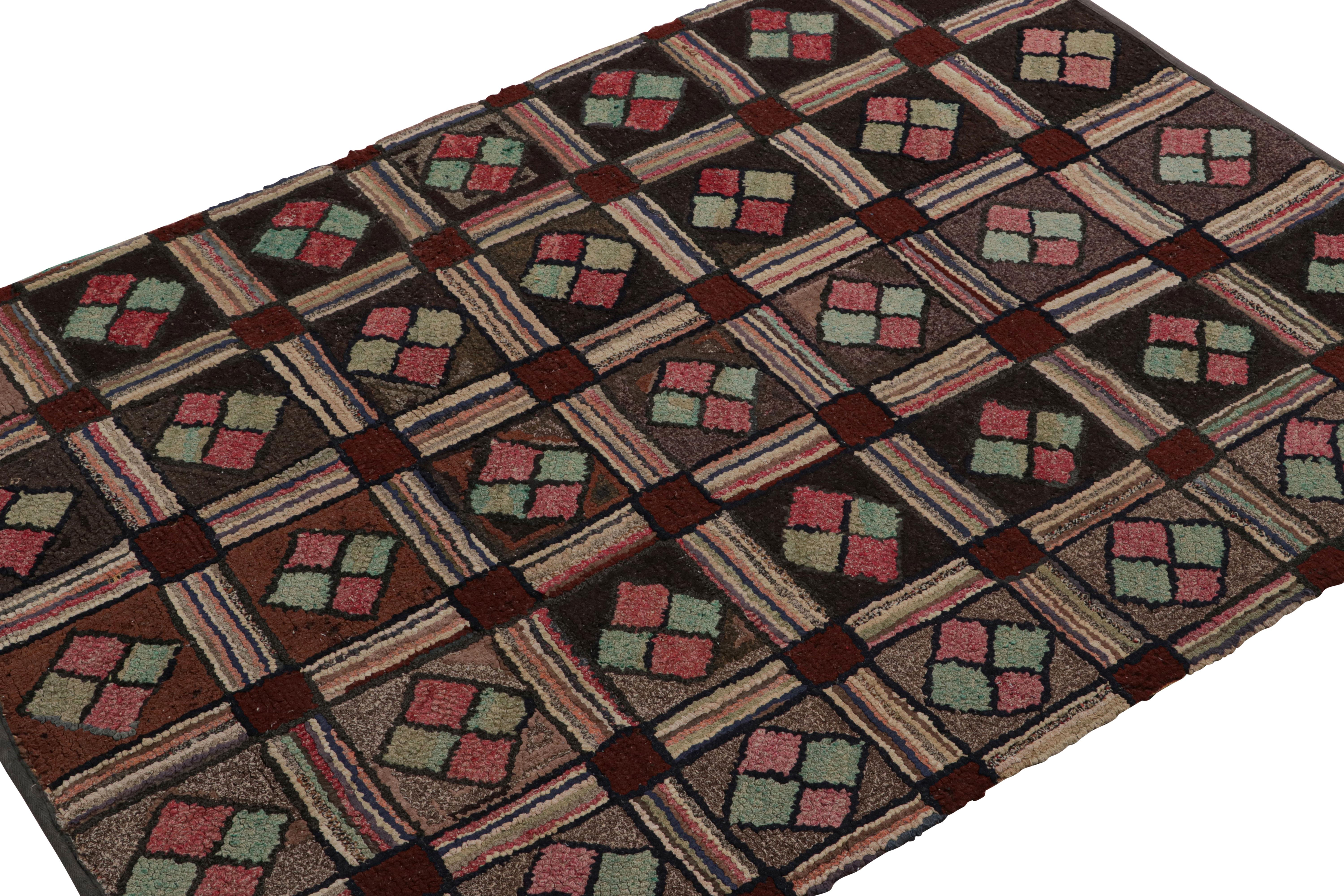 A rare 3x4 antique hooked rug of United States’ provenance, handmade in wool and fabric, circa 1920-1930, featuring repetitive geometric patterns. 

On the Design: 

This collectible piece enjoys repetitive geometric patterns arranged in grids in a
