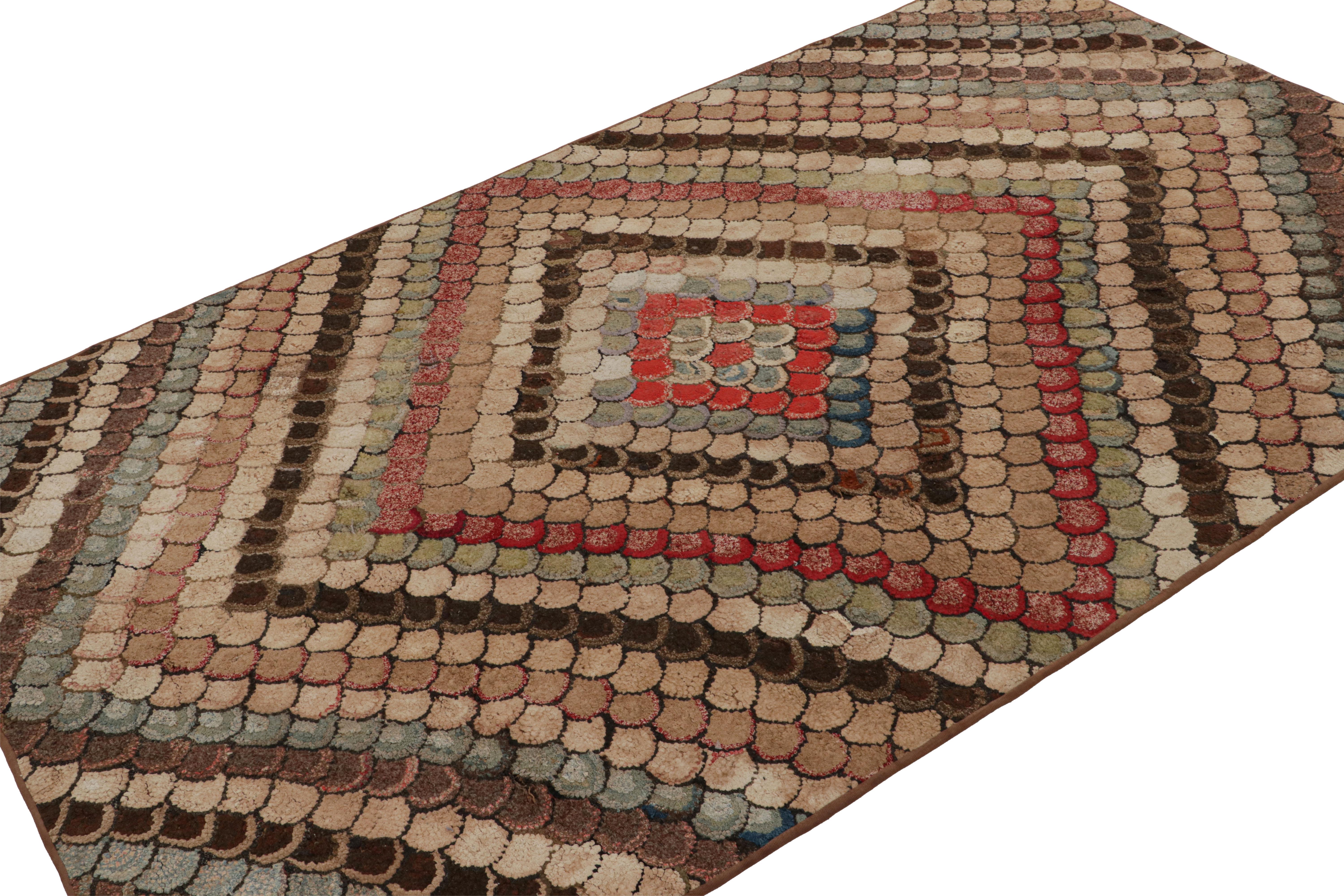 A rare 4x6 antique hooked rug of United States’ provenance, handmade in wool and fabric, circa 1920-1930, featuring polychromatic geometric patterns. 

On the Design: 

This collectible piece enjoys geometric patterns in a polychromatic colorway.
