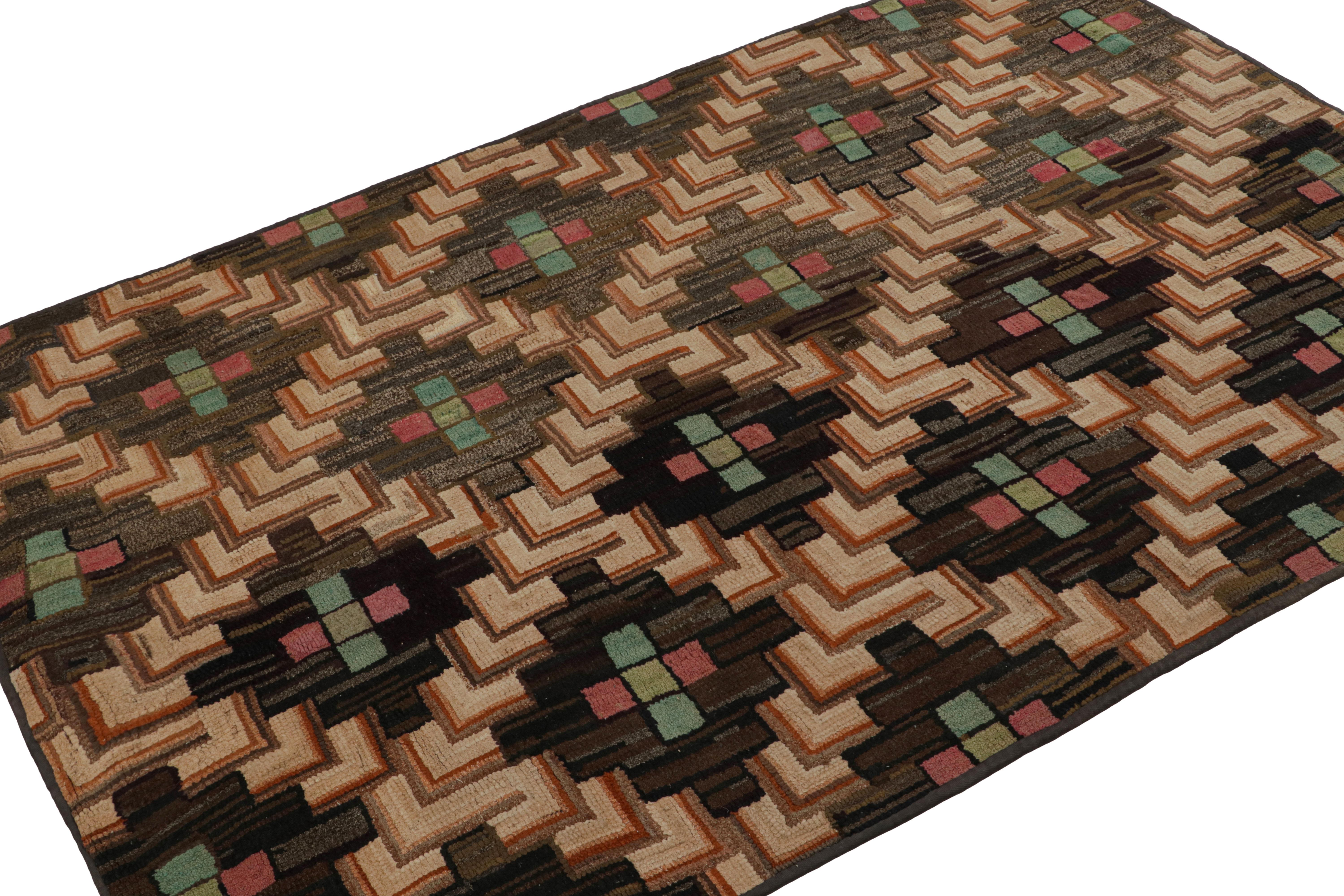 A rare 4x6 antique hooked rug of United States’ provenance, handmade in wool and fabric, circa 1920-1930, featuring polychromatic geometric patterns. 

On the Design: 

This collectible piece enjoys geometric patterns in a polychromatic colorway.