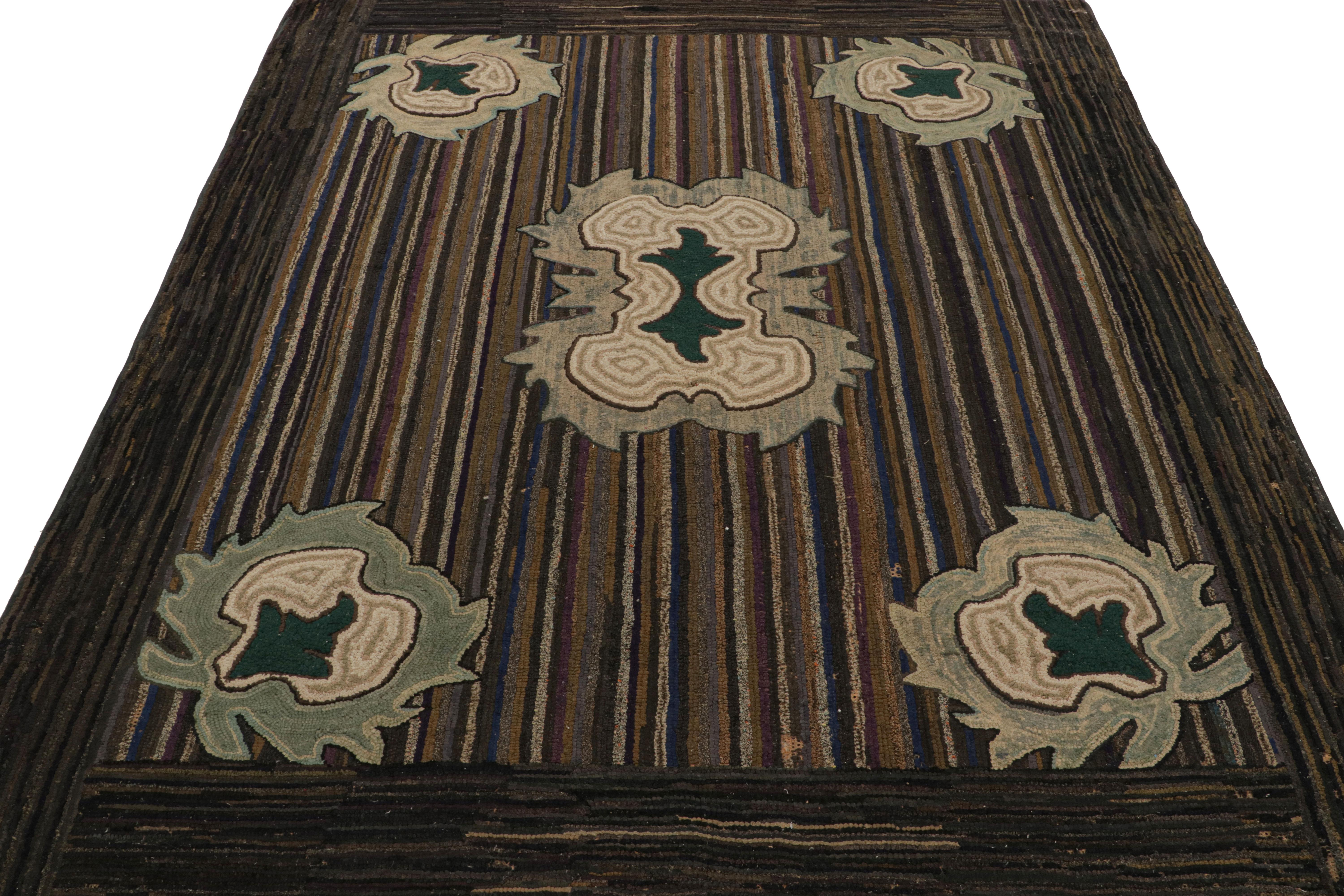 Americano Tappeto antico con ganci, strisce e medaglioni policromi, da Rug & Kilim
