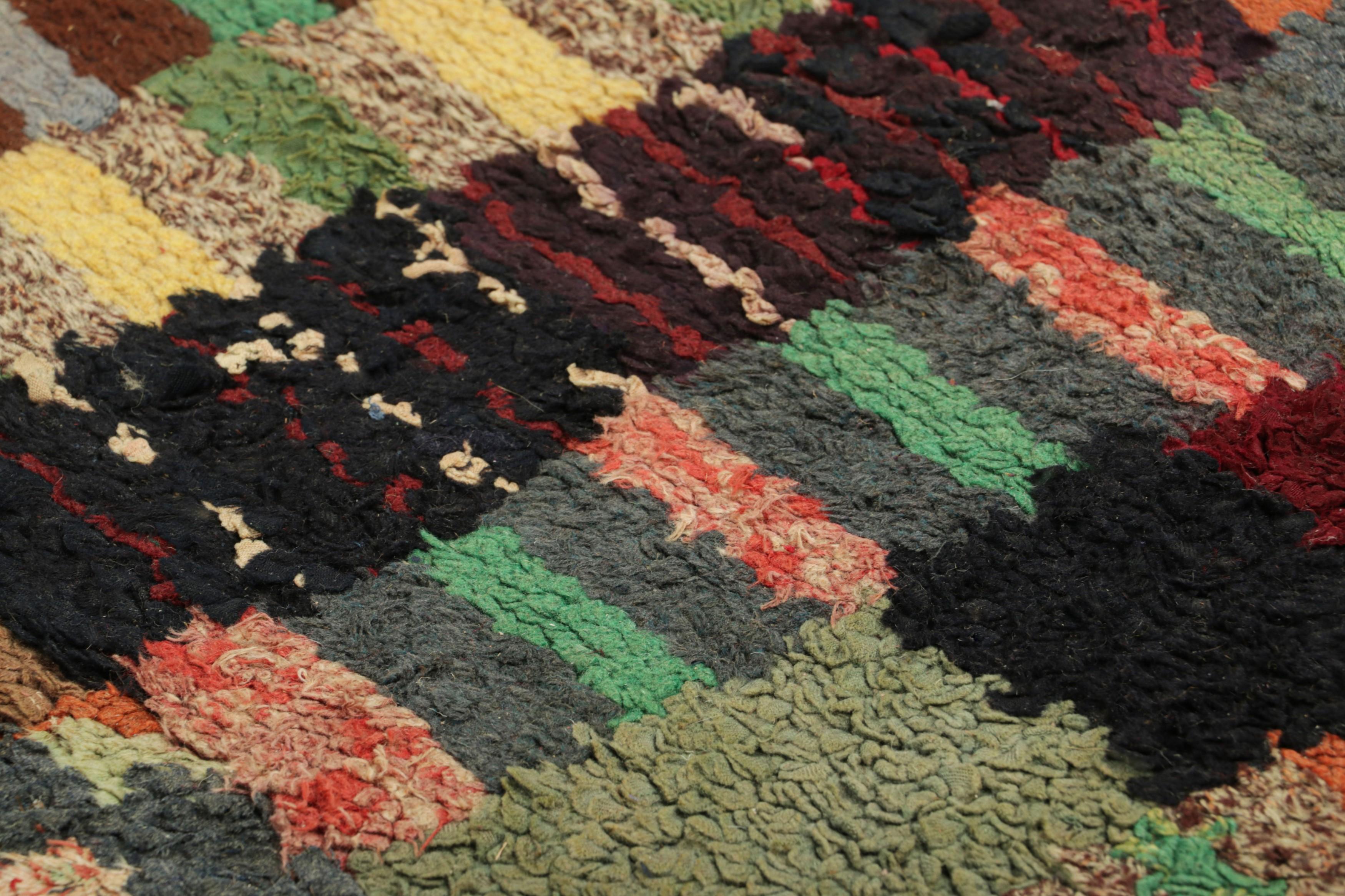 Handmade in wool and originating circa 1920-1930, this 2x3 antique rug is a rare and exciting new curation in Rug & Kilim’s collection of American hooked rugs.

On the Design: 

Admirers of the craft will note this piece is a special find among some