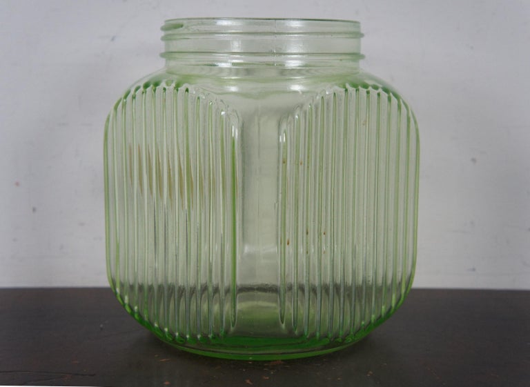 The Green Eyed Lady - This 1930's uranium glass biscuit barrel