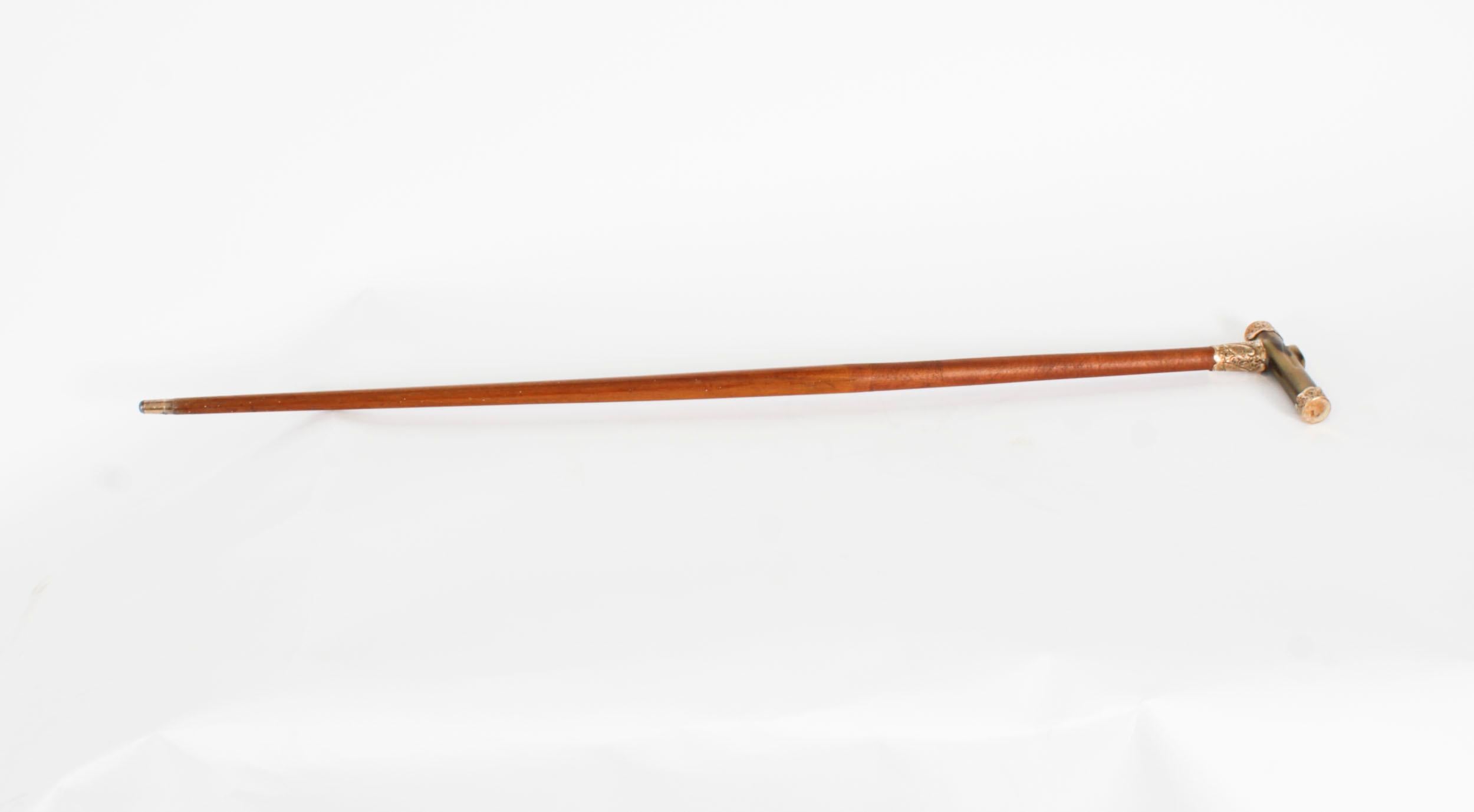 This is a beautiful antique English horn handled gold mounted handle walking stick/swagger stick, circa 1880 in date

The striking stick features an ornate gold mounted horn crutch handle inscribed 'F Spinks, Coxhoe' featuring a gentle tapering