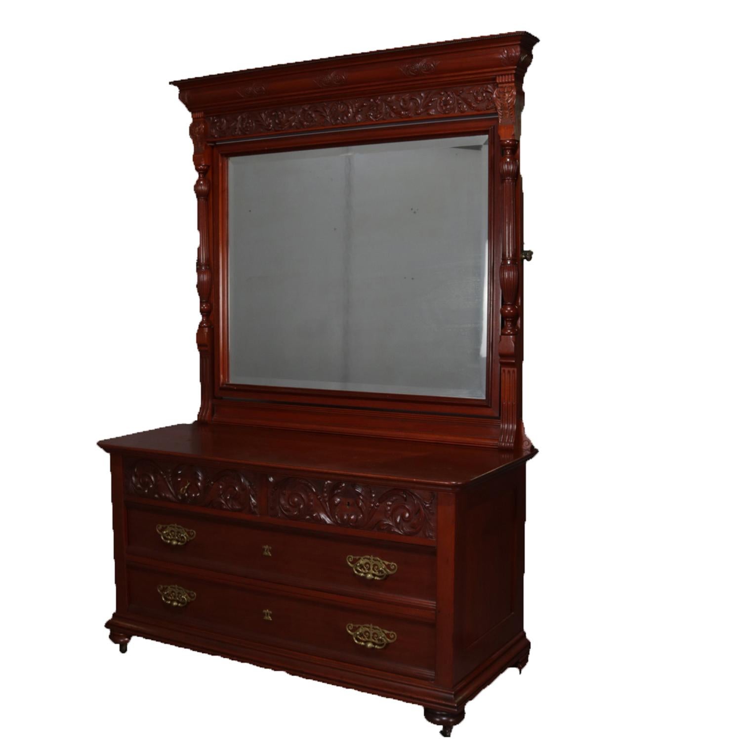 Antique Victorian Horner school mahogany chest of drawers features carved foliate, scroll and acanthus decoration and beveled mirror, circa 1900.
 
   
Measures: 81