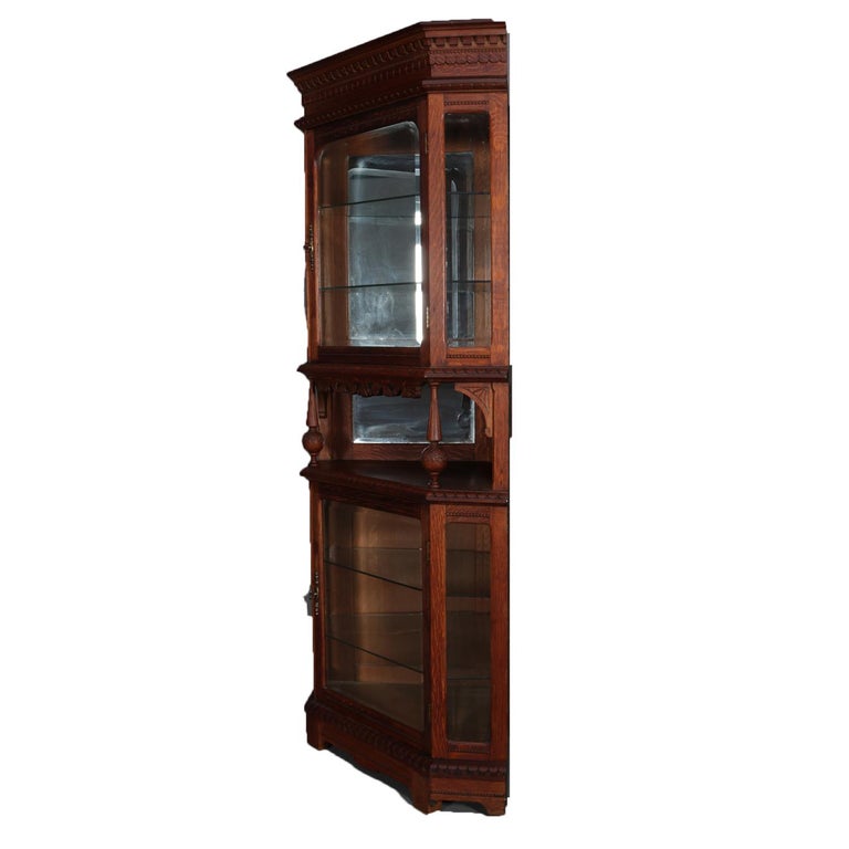 Antique Horner School Carved Oak Corner China Cabinet Circa An Antique Horner School Corner Cabinet Features Faceted Form With Oak Construction Having Gl Enclosed Upper