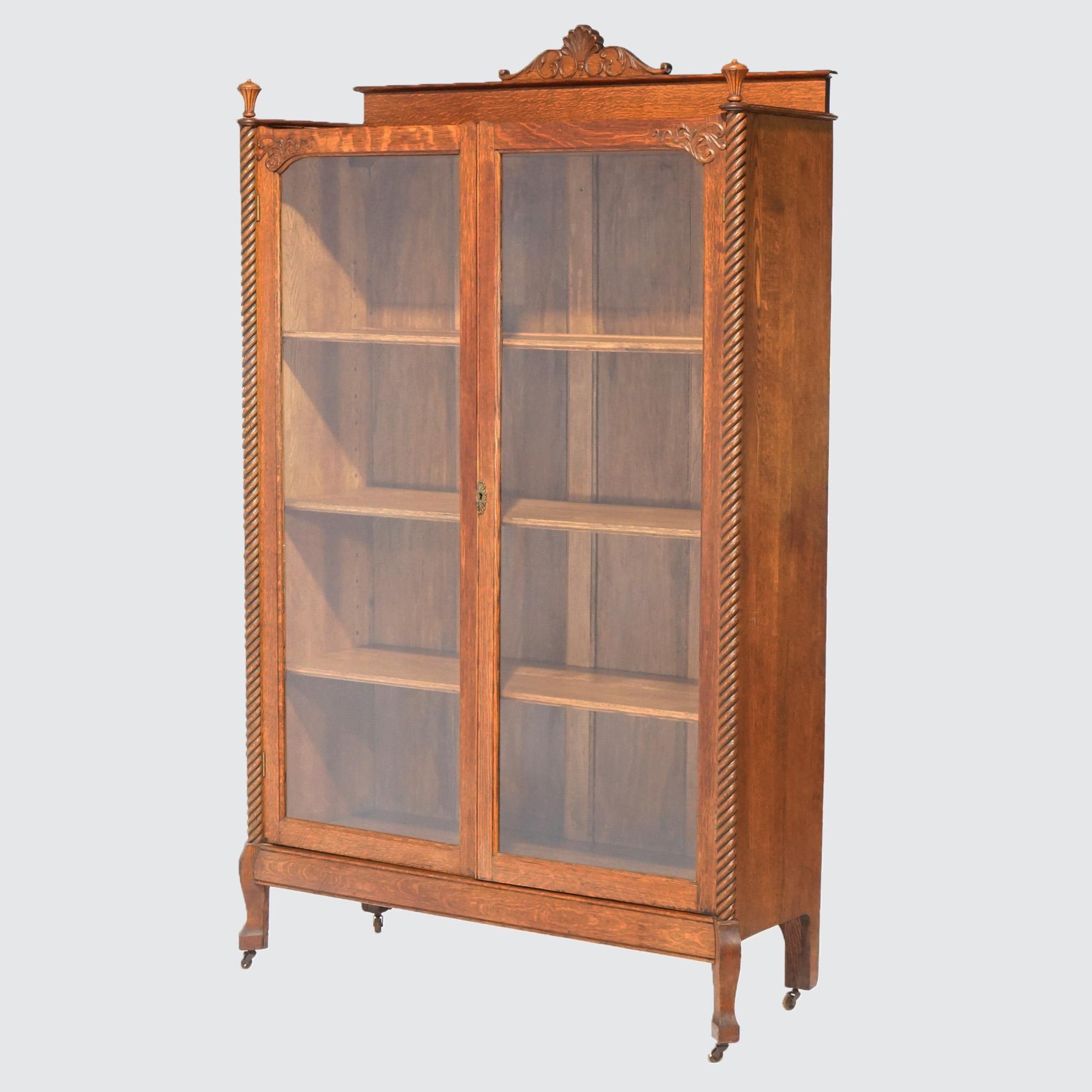antique oak bookcase with glass doors