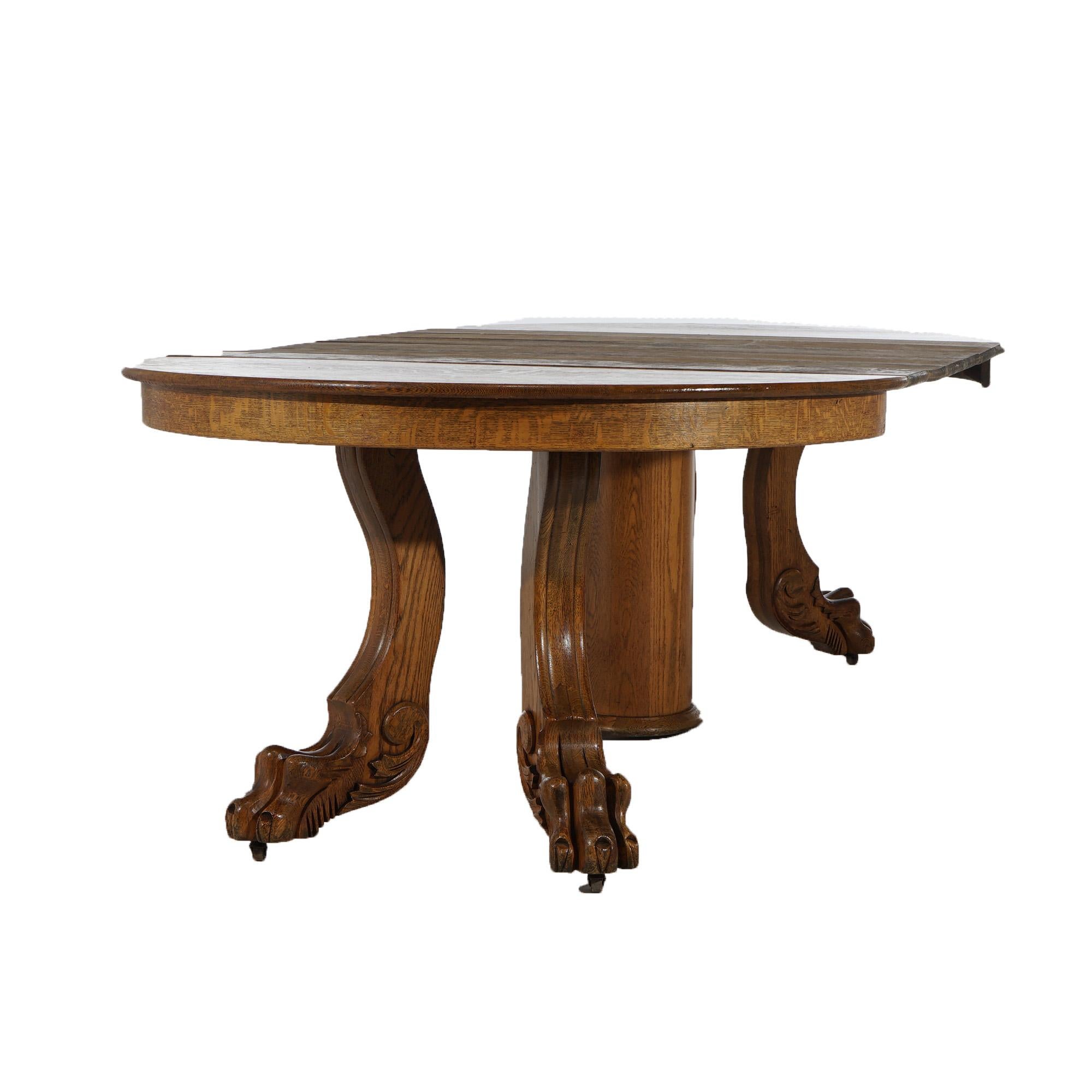 20th Century Antique Horner School Round Carved Oak Clawfoot Dining Table & Six Leaves C1920