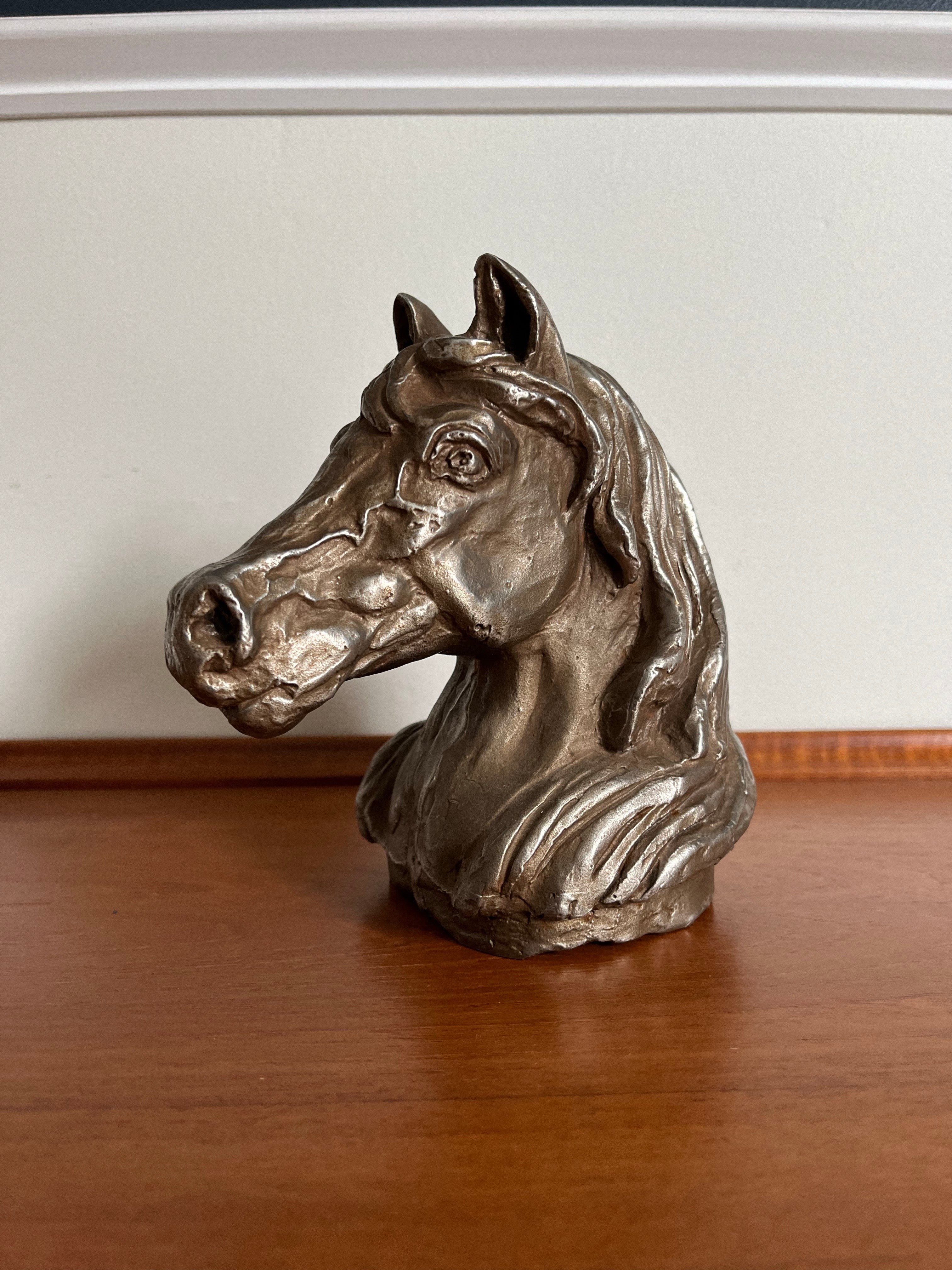 Heavy solid metal horse head. Rich details and expression. Deceivingly heavy at 15.8lbs. 