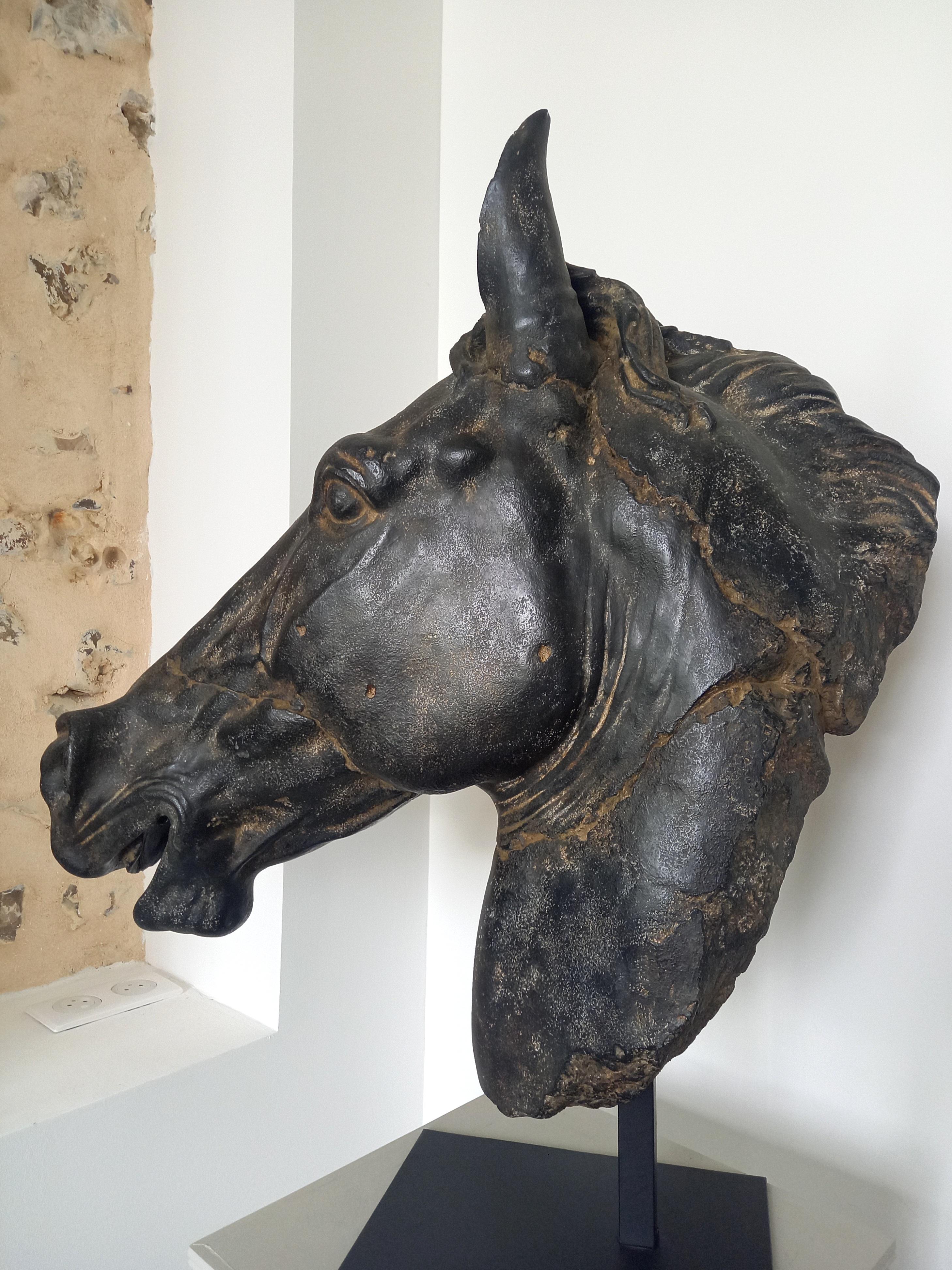 Remarkable reproduction of a historic bronze sculpture, this one is made of marble powder and resin, solid and light.
The patina is extraordinary ans very representative of an antique black stone.
It was made in a French workshop and patinated by