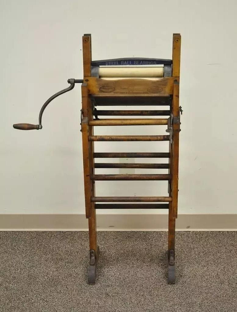 Antique Horse Shoe Brand Clothing American Upright Wringer Folding Bench Clothes. Item feature Compact folding form which opens up to a full bench, solid wood construction, very nice antique item. Circa 19th Century. Measurements: Folded: 45