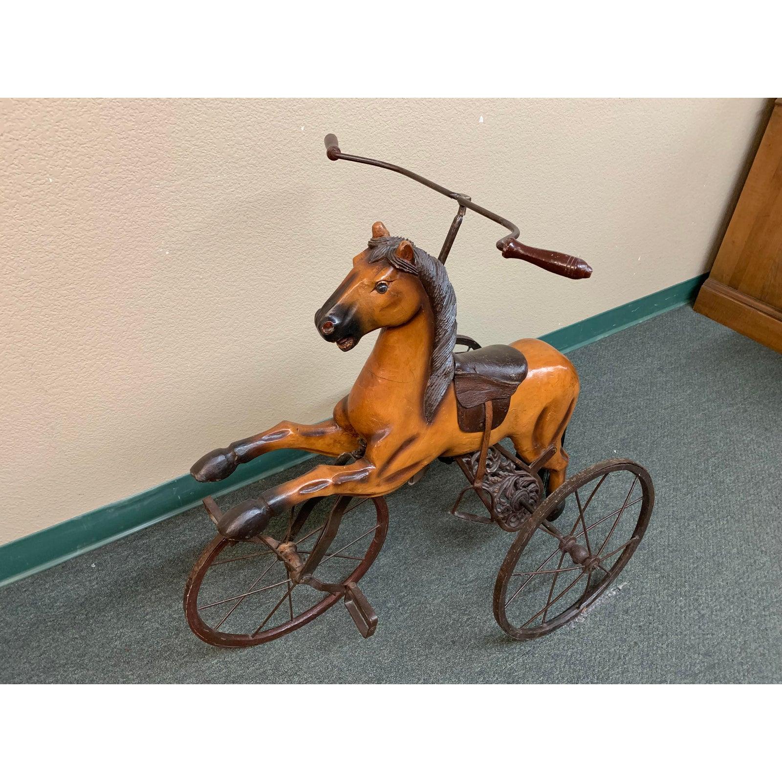 Antique-

 Horse tricycle. Measures: 33W 21D 33H.