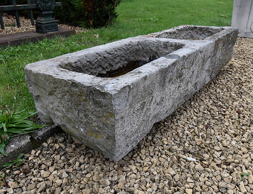 A large antique horse trough from the 19th century
made from Belgian bluestone.